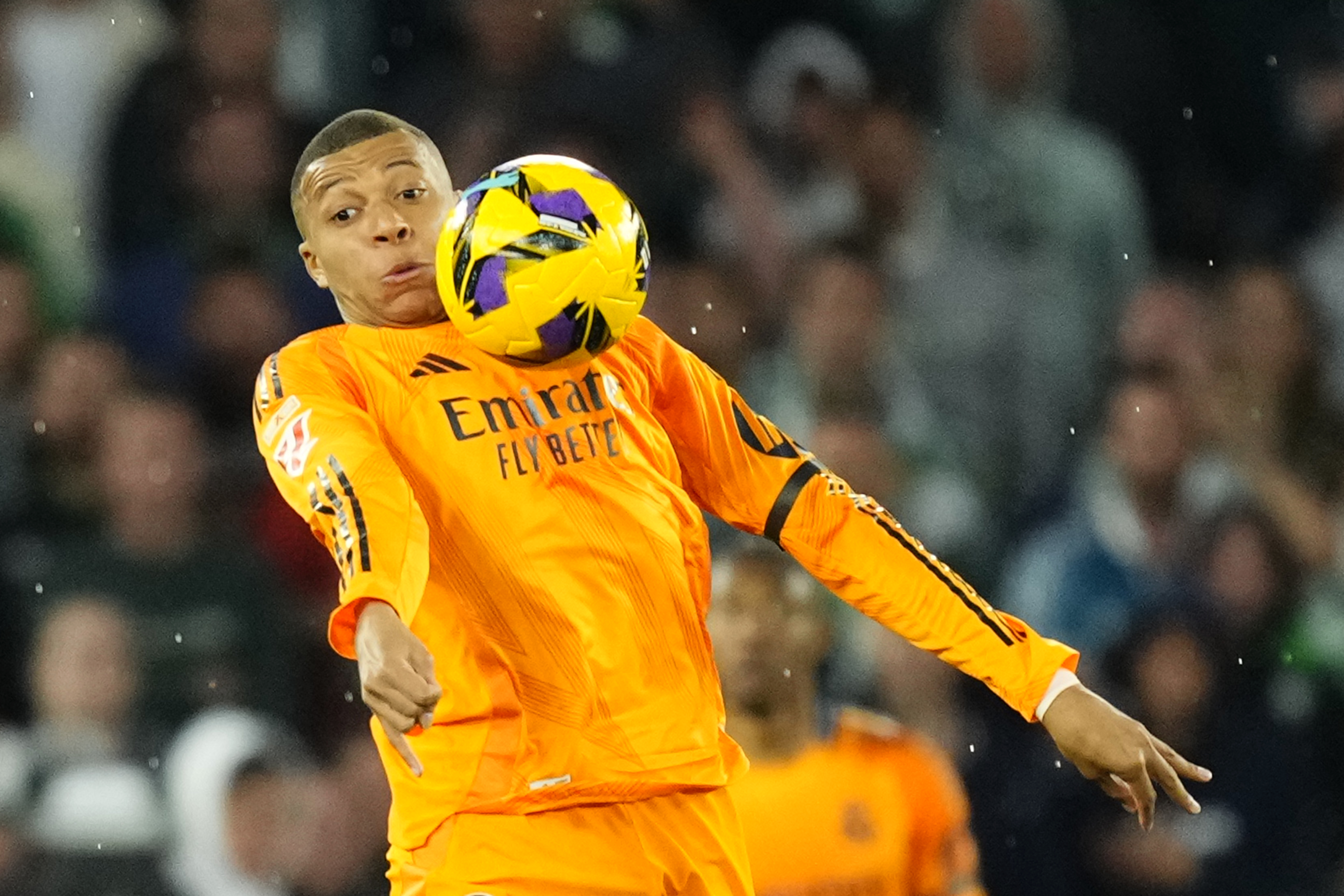 Real Madrid's Kylian Mbappe controls the ball during a Spanish La Liga soccer match between Real Betis and Real Madrid at the Benito Villamarin stadium in Seville, Spain, Saturday, March 1, 2025. 