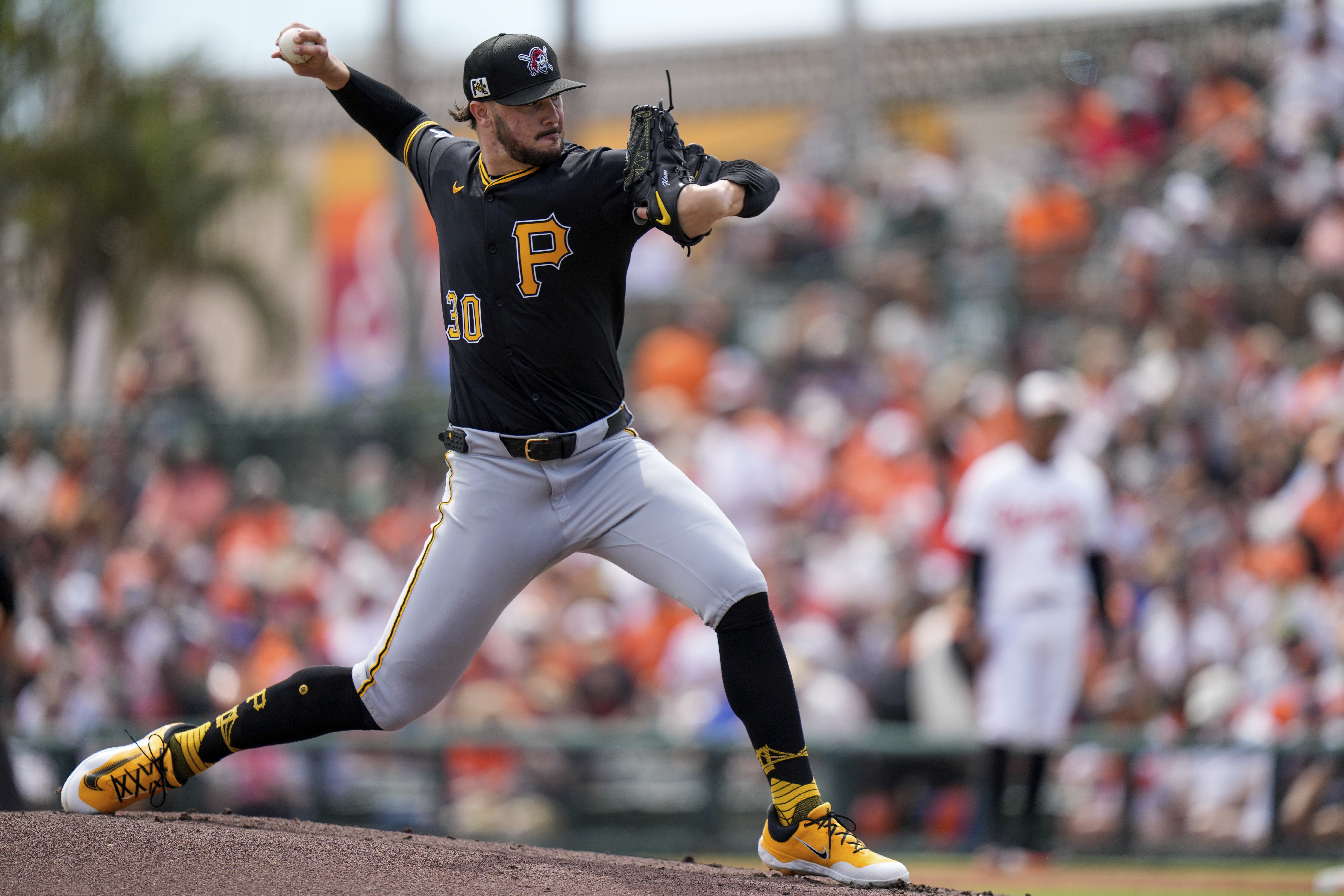 Pittsburgh Pirates starting pitcher Paul Skenes (30) delivers during the first inning of a spring training baseball game against the Baltimore Orioles, Saturday, March 1, 2025, in Sarasota, Fla. 