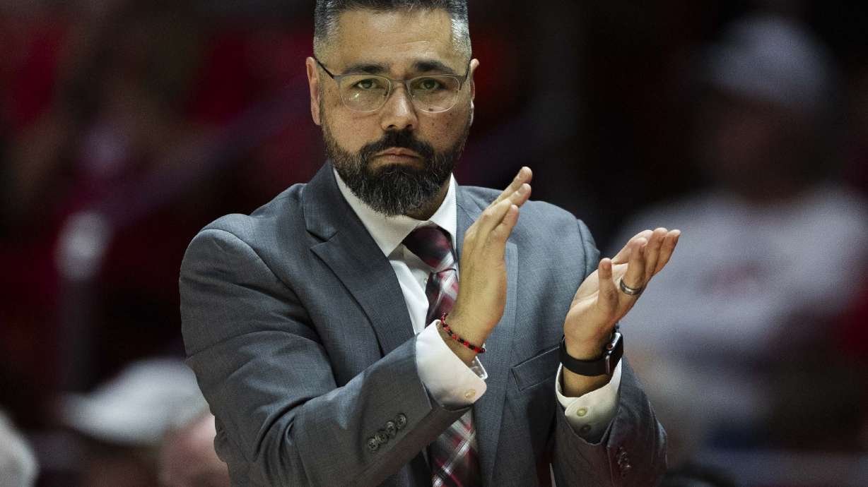 Utah Utes head coach Gavin Petersen cheers his team on from the sidelines during a Women’s NCAA basketball game between the Utah Utes and the BYU Cougars at the Jon M. Huntsman Center on the campus of the University of Utah in Salt Lake City on Saturday, March 1, 2025.