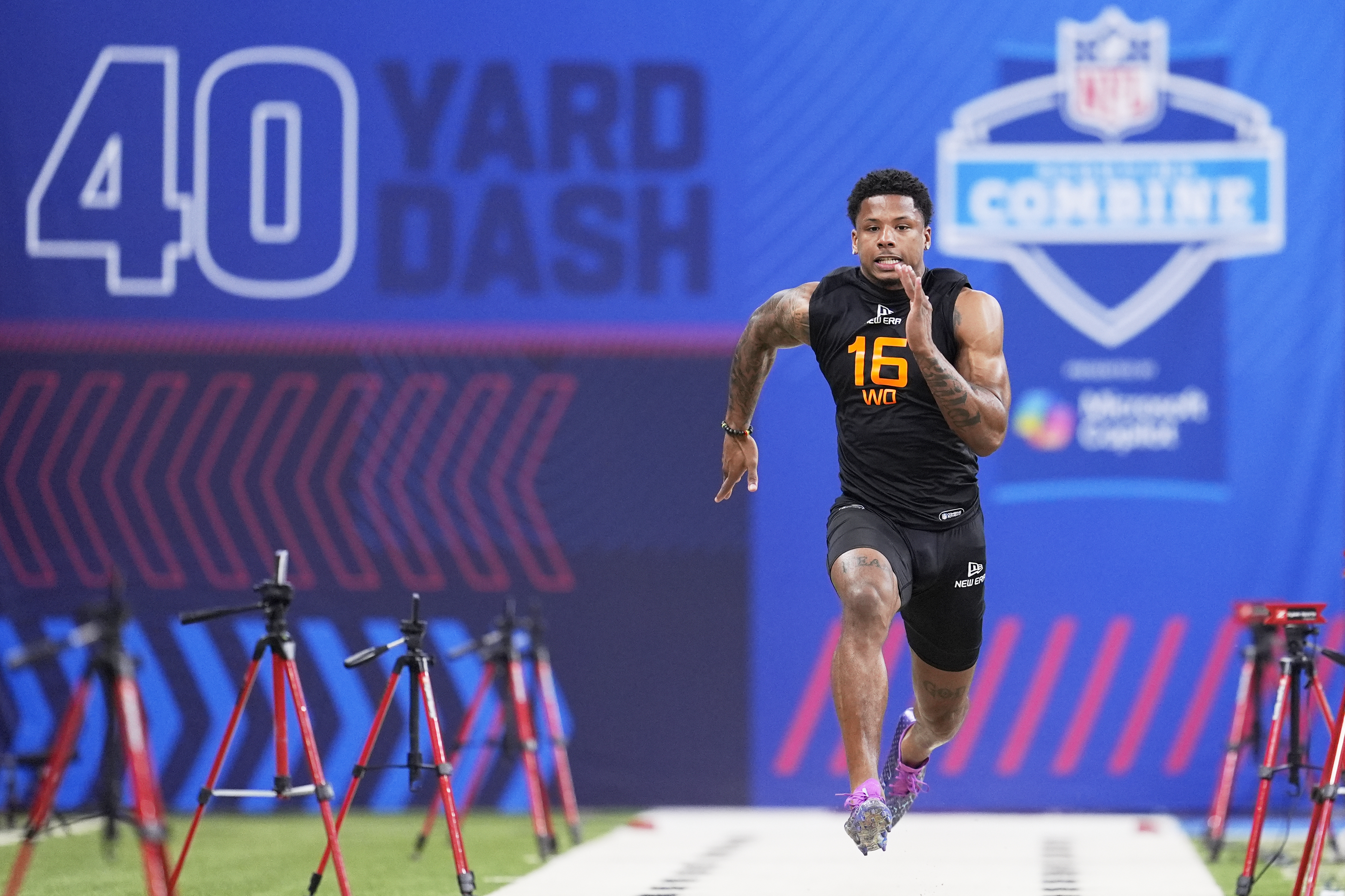 Texas wide receiver Matthew Golden runs the 40-yard dash at the NFL football scouting combine in Indianapolis, Saturday, March 1, 2025. 