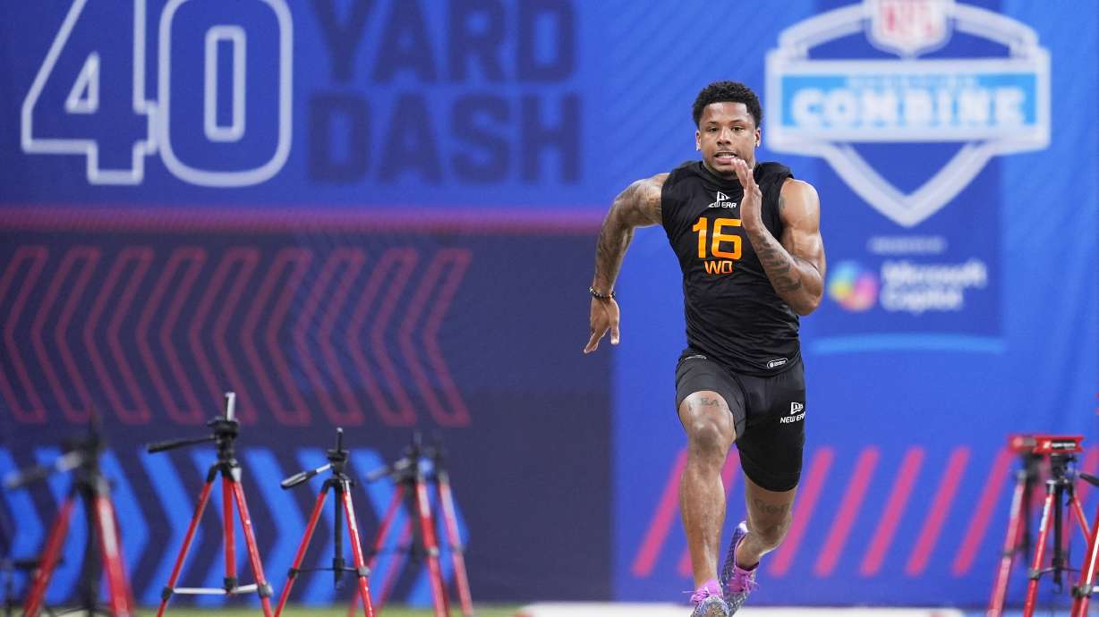 Texas wide receiver Matthew Golden runs the 40-yard dash at the NFL football scouting combine in Indianapolis, Saturday, March 1, 2025.