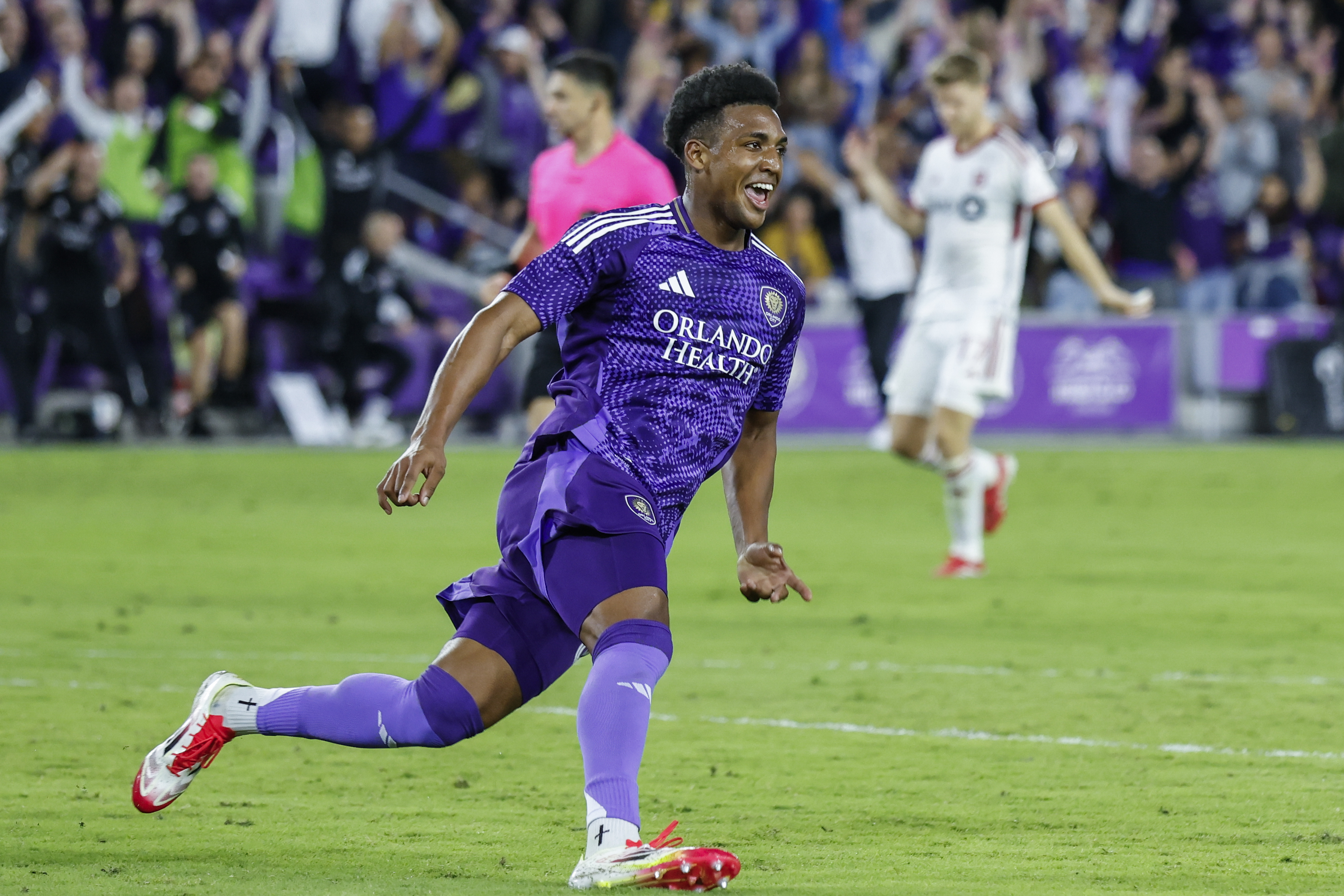 Orlando City defender Alex Freeman (30) reacts to scoring against Toronto FC during the first half of a MLS soccer match, Saturday, March 1, 2025, in Orlando, Fla.
