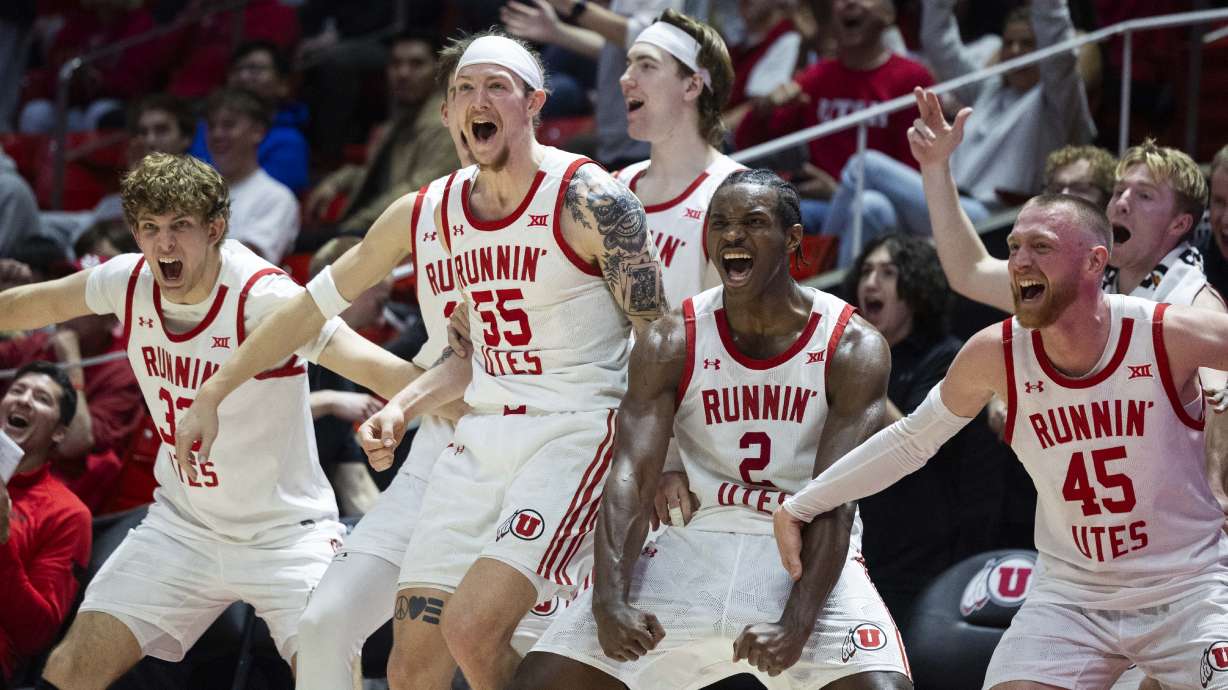 Utah Utes players celebrate from the sideline after a basket by Utah Utes guard Brady Smith (6) during a NCAA mens basketball game between the Utah Utes and the Arizona State Sun Devils at the Jon M. Huntsman Center on the campus of the University of Utah in Salt Lake City on Saturday, March 1, 2025. The Utah Utes won the game with a final score of 99-73.