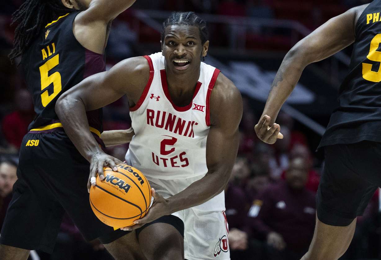 Utah Utes forward Ezra Ausar (2) drives the ball to the basket during a NCAA mens basketball game between the Utah Utes and the Arizona State Sun Devils at the Jon M. Huntsman Center on the campus of the University of Utah in Salt Lake City on Saturday, March 1, 2025. The Utah Utes won the game with a final score of 99-73.