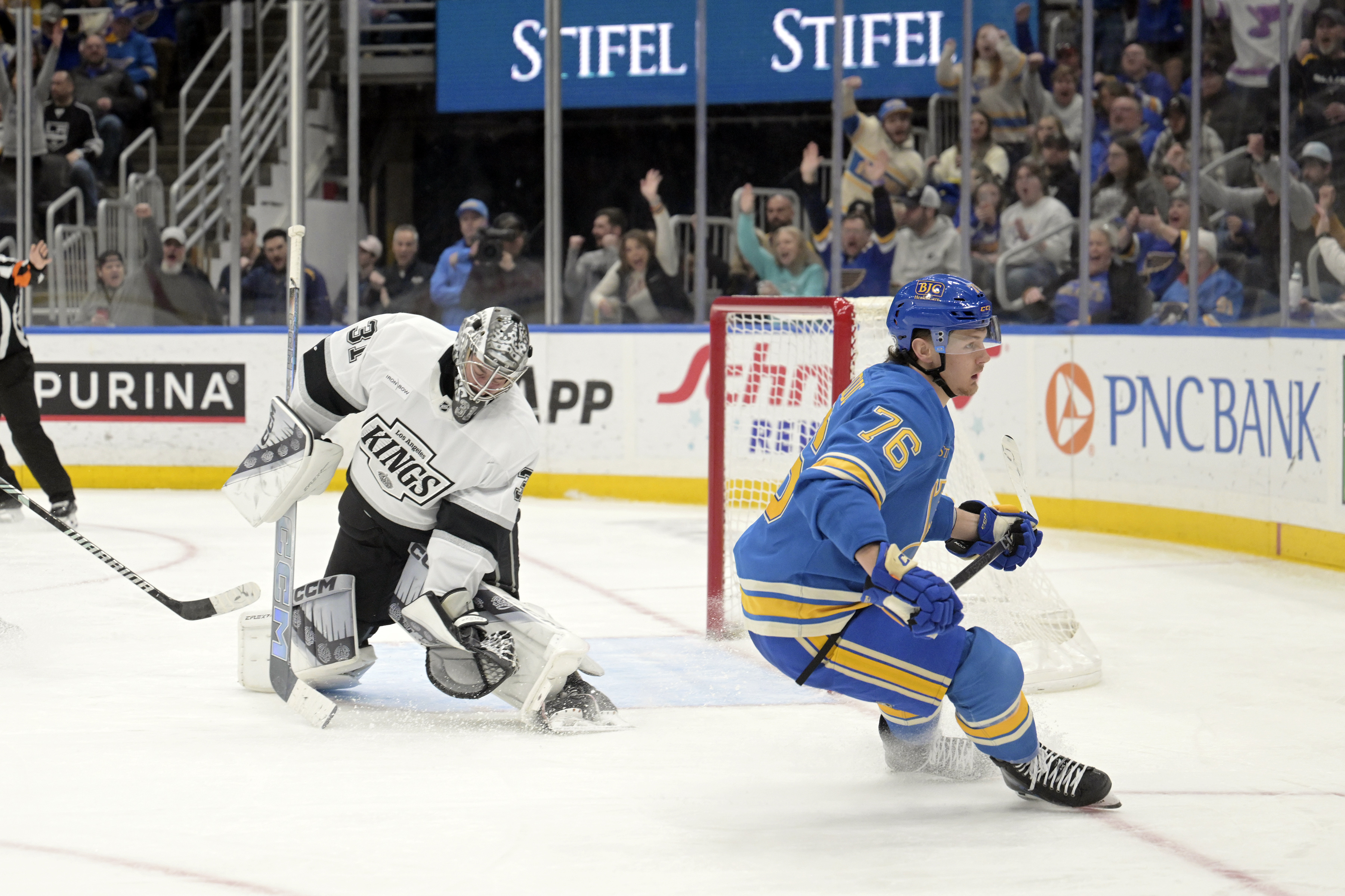 St. Louis Blues' Zack Bolduc (76) scores against /Los Angeles Kings' David Rittich (31) during the second period of an NHL hockey game Saturday, March 1, 2025, in St. Louis.