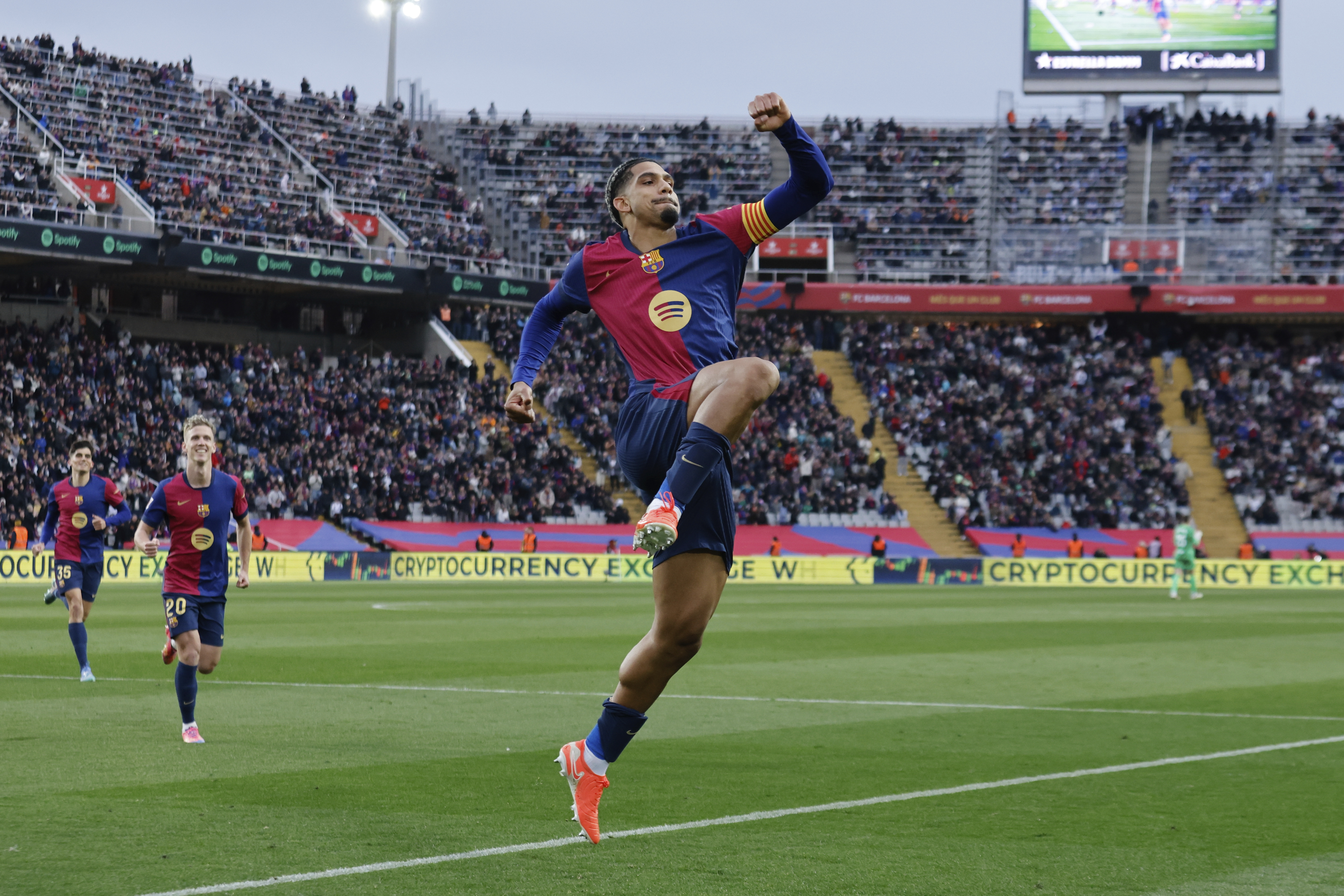 Barcelona's Ronald Araujo celebrates scoring his side's 3rd goal during the Spanish La Liga soccer match between Barcelona and Real Sociedad at the Lluis Companys Olympic Stadium in Barcelona, Spain, Sunday, March 2, 2025. 