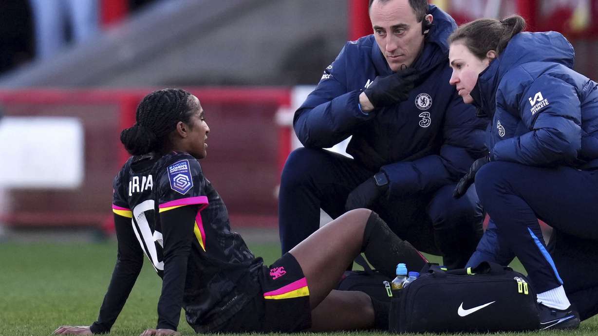 Chelsea's Naomi Girma receives treatment before being substituted during the Barclays Women's Super League match at the Broadfield Stadium, Brighton and Hove, England, Sunday, March 2, 2025.