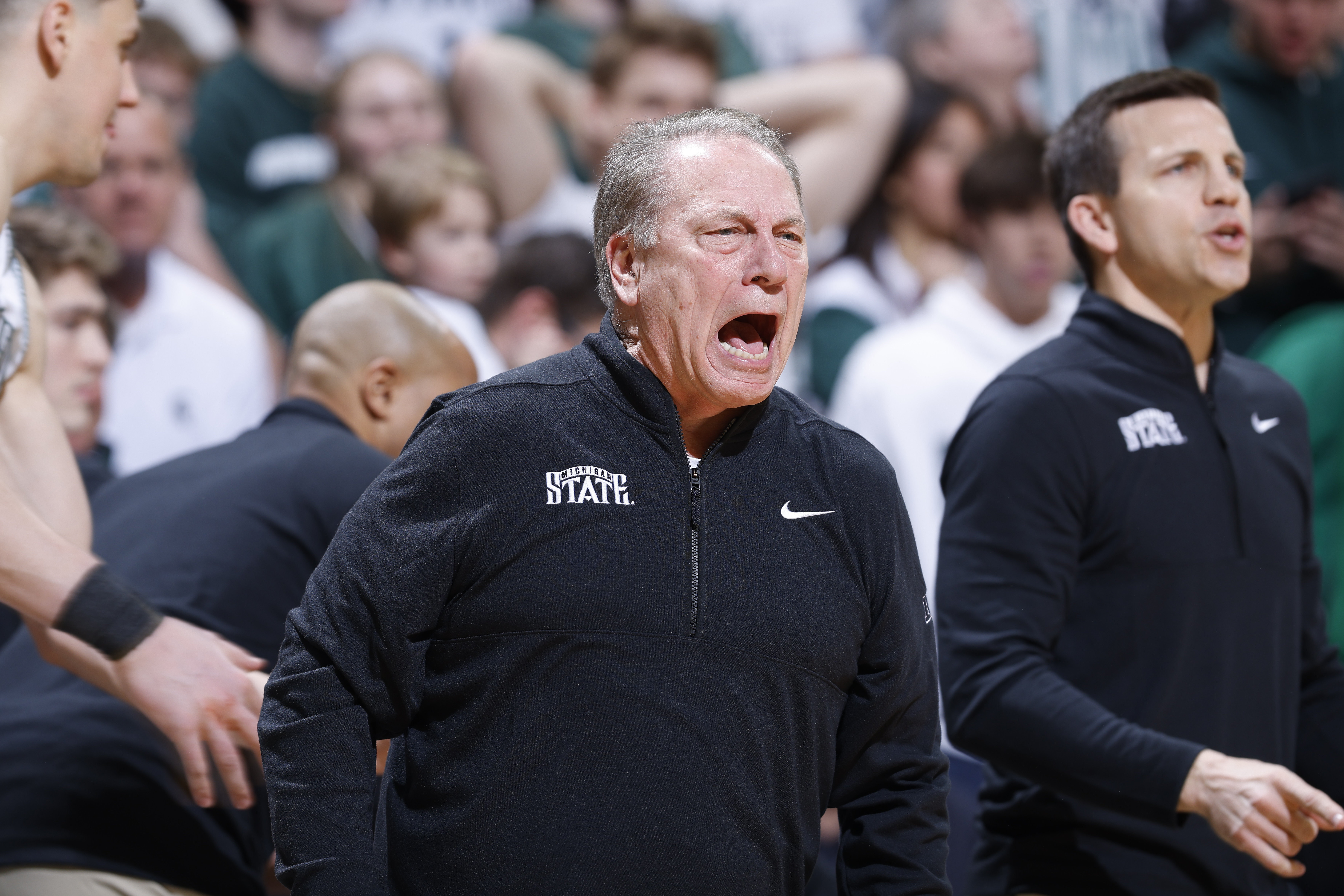 Michigan State coach Tom Izzo, center, reacts during the first half of an NCAA college basketball game against Wisconsin, Sunday, March 2, 2025, in East Lansing, Mich. 