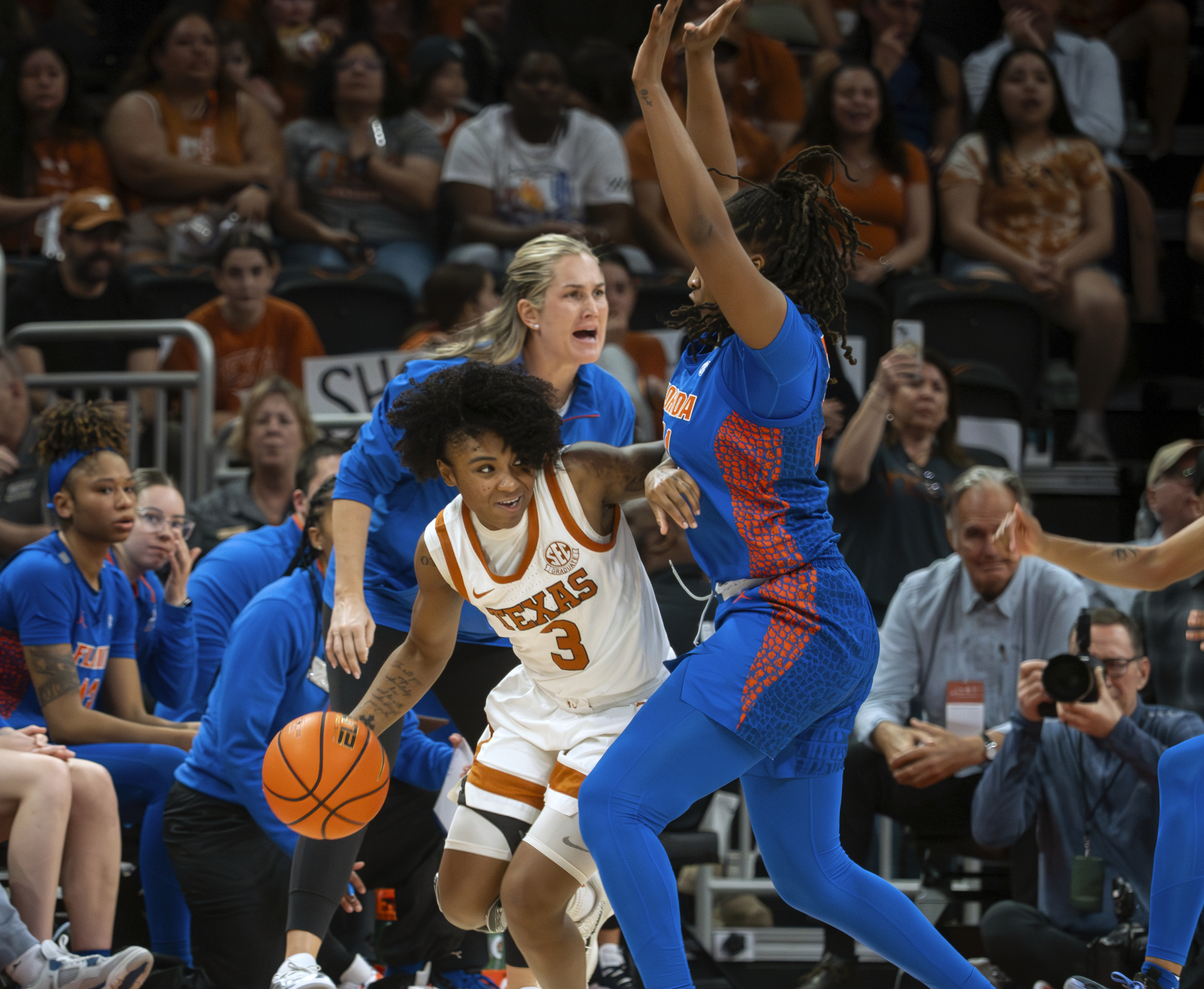 Texas guard Rori Harmon (3) looks to pass the ball against Florida forward Eriny Kindred, right, during the first half an NCAA college basketball game, Sunday, March 2, 2025, in Austin, Texas. 