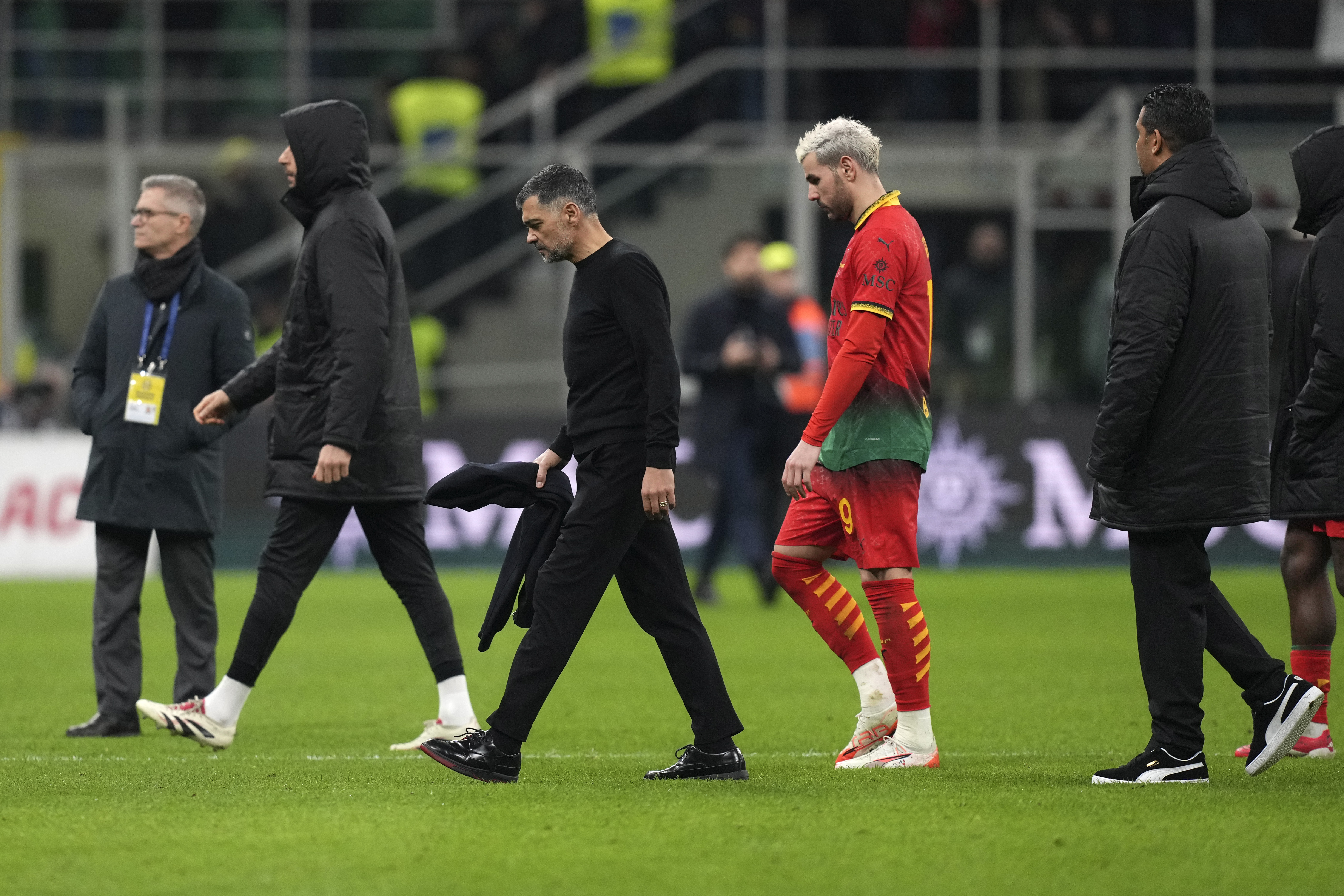 AC Milan's head coach Sergio Conceicao walks off the pitch after the Serie A soccer match between AC Milan and Lazio at the San Siro stadium, in Milan, Italy, Sunday, March 2, 2025. 