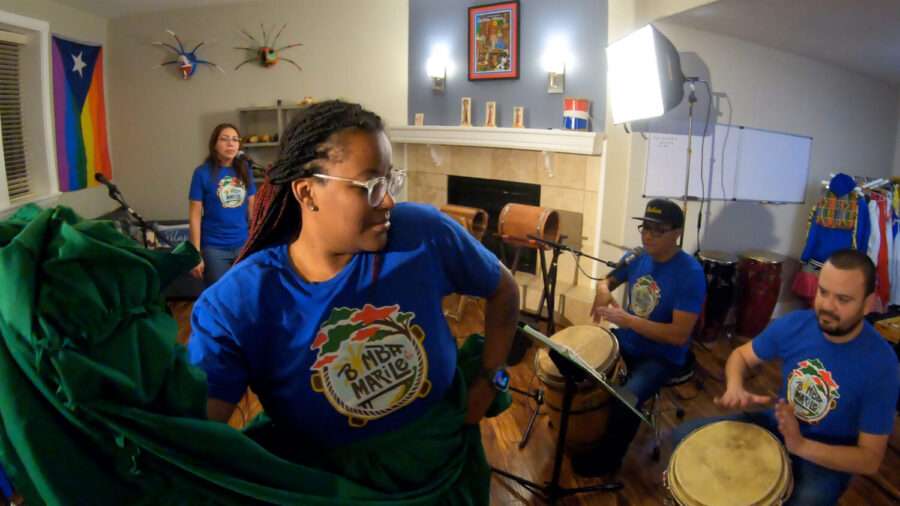 Liliana Rodriguez, a member of Bomba Marilé, dances during rehearsal in Salt Lake City.