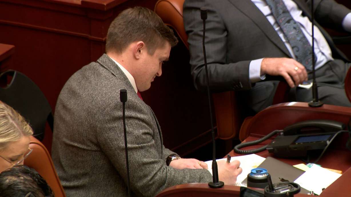 Rep. Tyler Clancy, R-Provo, sits at his desk in the Utah House of Representatives on Thursday.