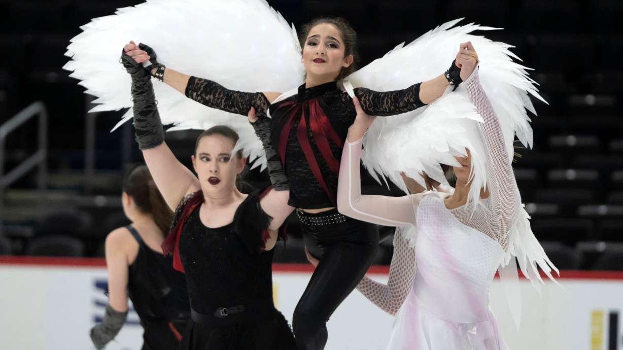 Members of the Capital Theatre on Ice Senior Team perform at Capital One Arena as Washington-area figure skaters gathered in advance of the Legacy on Ice skating event Sunday, organized to honor figure skaters and coaches who died in the recent plane crash, on Feb. 17 in Washington.