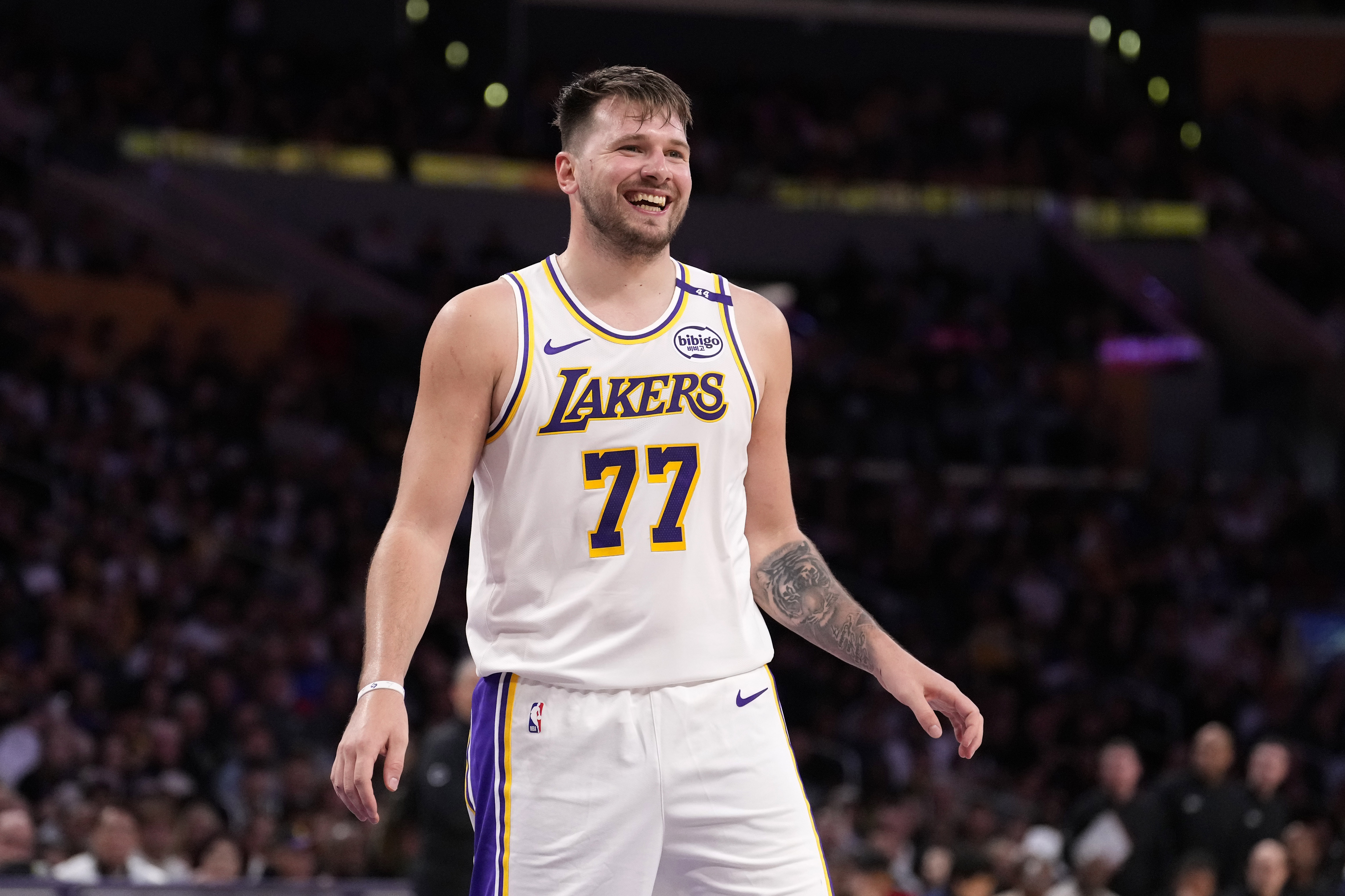 Los Angeles Lakers guard Luka Doncic smiles during the second half of an NBA basketball game against the Los Angeles Clippers, Sunday, March 2, 2025, in Los Angeles.