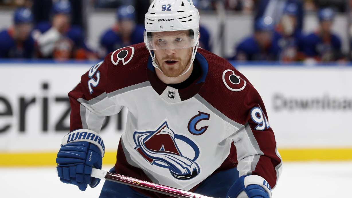 FILE - Colorado Avalanche left wing Gabriel Landeskog skates against the New York Islanders during an NHL hockey game March 7, 2022, in Elmont, N.Y.