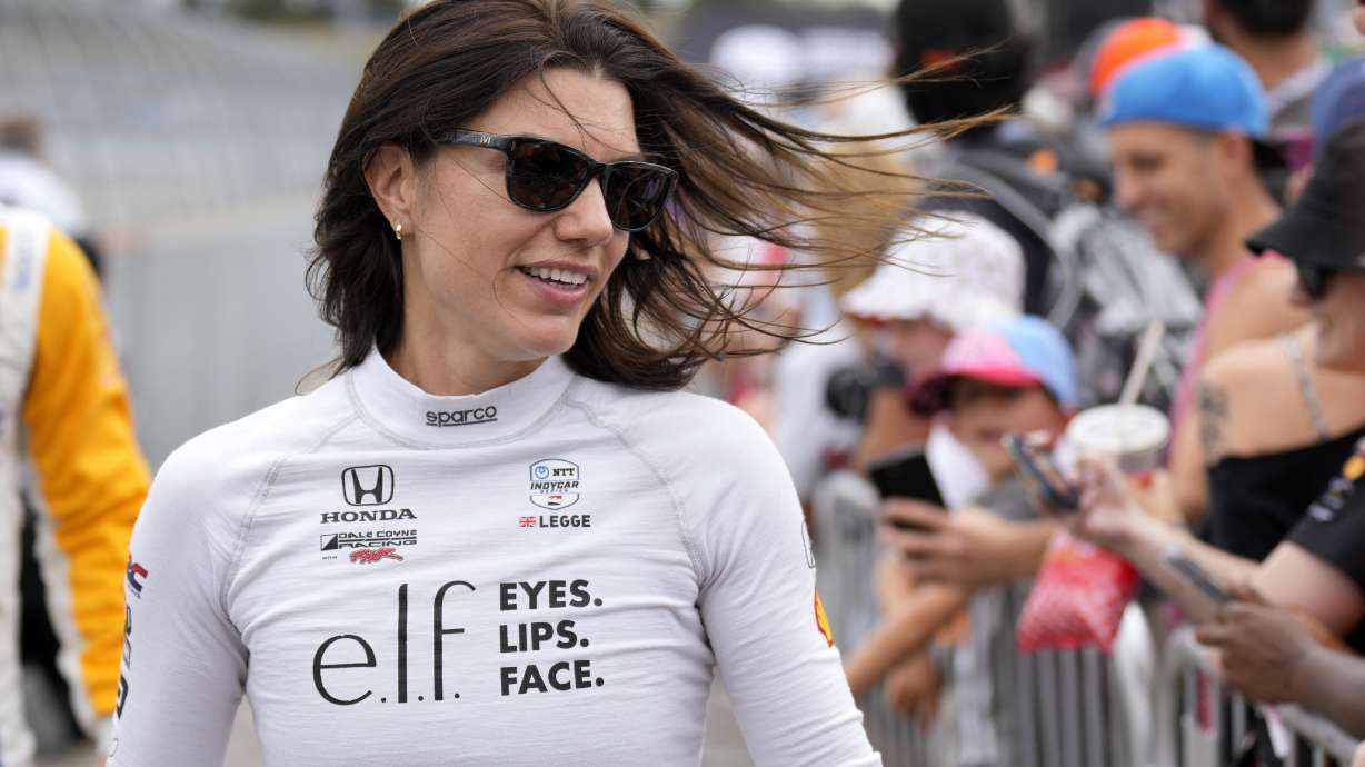 FILE - Katherine Legge greets fans before an IndyCar auto race, Sept. 15, 2024, at the Nashville Superspeedway in Lebanon, Tenn.