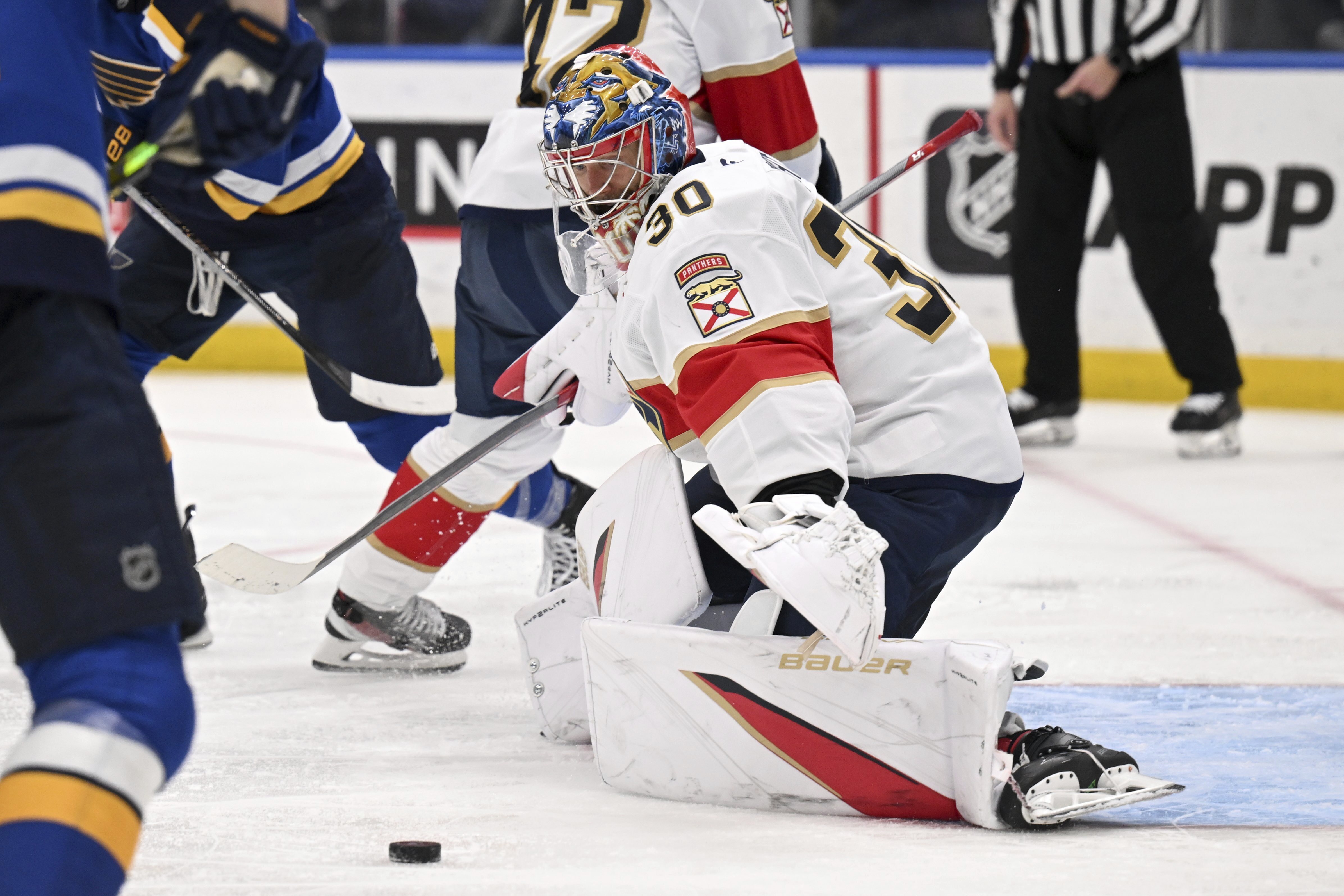 Florida Panthers' Spencer Knight (30) defends the net against the St. Louis Blues' during the second period of an NHL hockey game Thursday, Feb. 6, 2025, in St. Louis. 