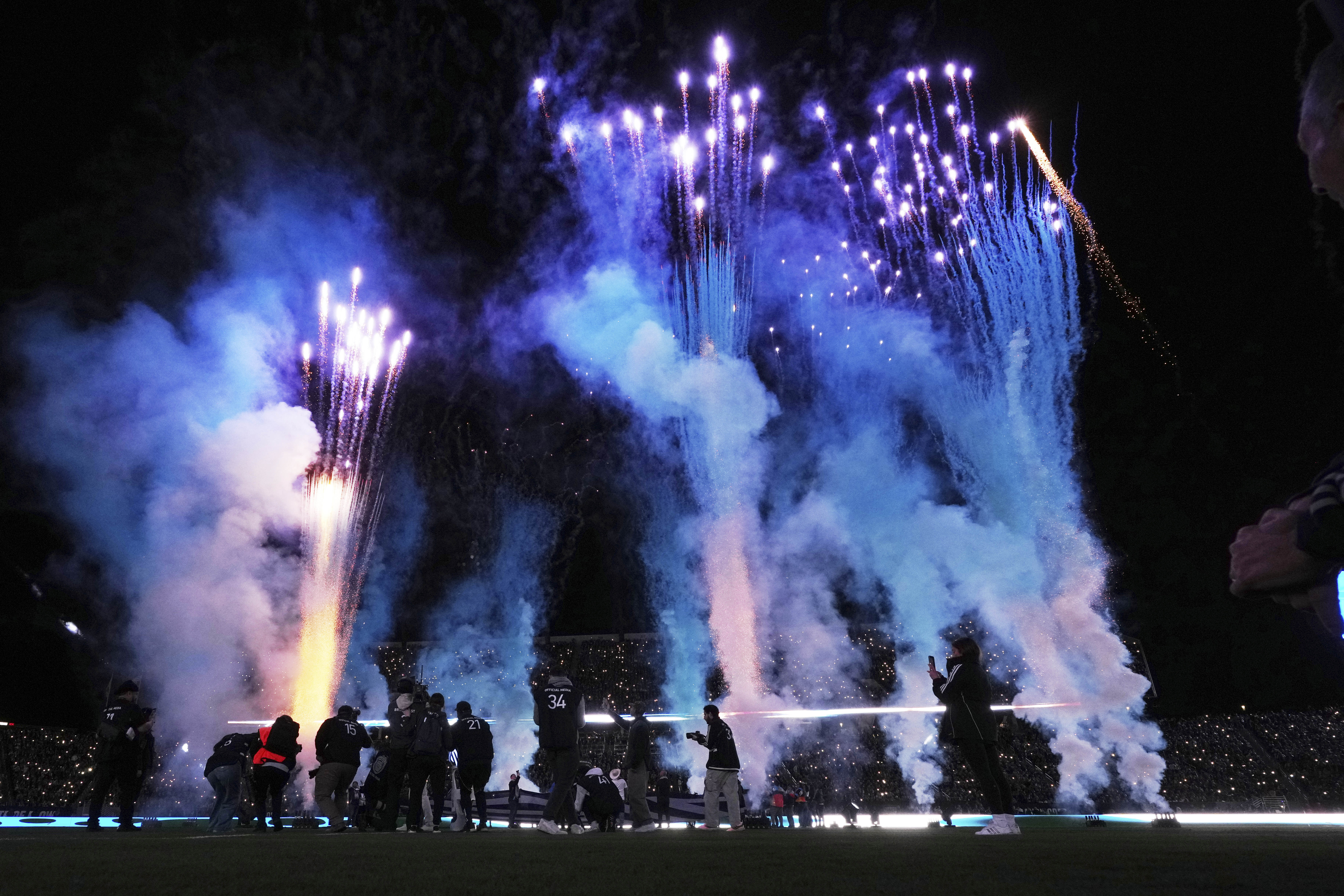 Fireworks illuminate the field during a ceremony before San Diego FC hosts an MLS soccer match against St. Louis City Saturday, March 1, 2025, in San Diego. 