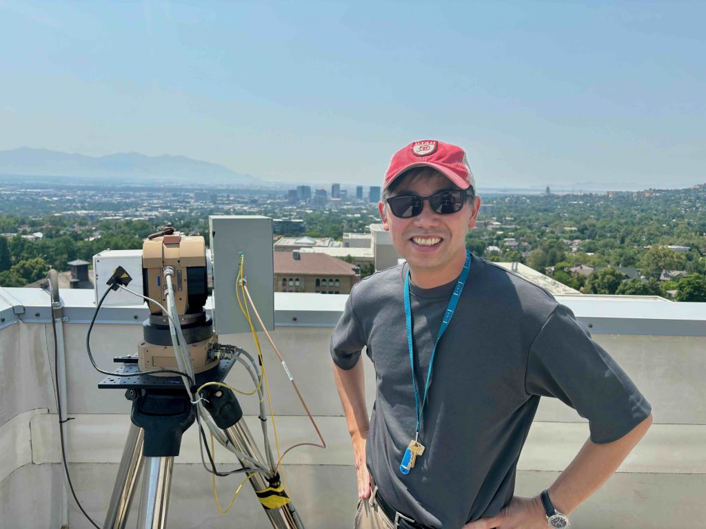 John Lin, University of Utah professor of atmospheric sciences, on the roof of the Browning building where a phalanx of air quality monitoring instruments is stationed. New research from U. and University of California scientists shows lower per-vehicle concentrations of carbon monoxide emissions on Los Angeles freeways compared to Salt Lake freeways.