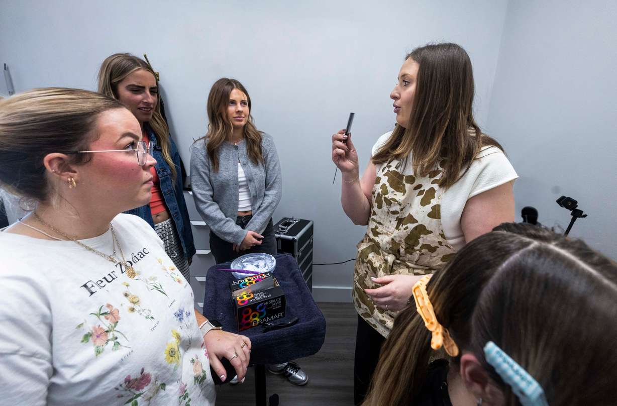 Instructor Brynn Black, right, talks with her hair design apprentices before they start working on a client's hair at Shade Nine Salon in American Fork on Feb. 27.