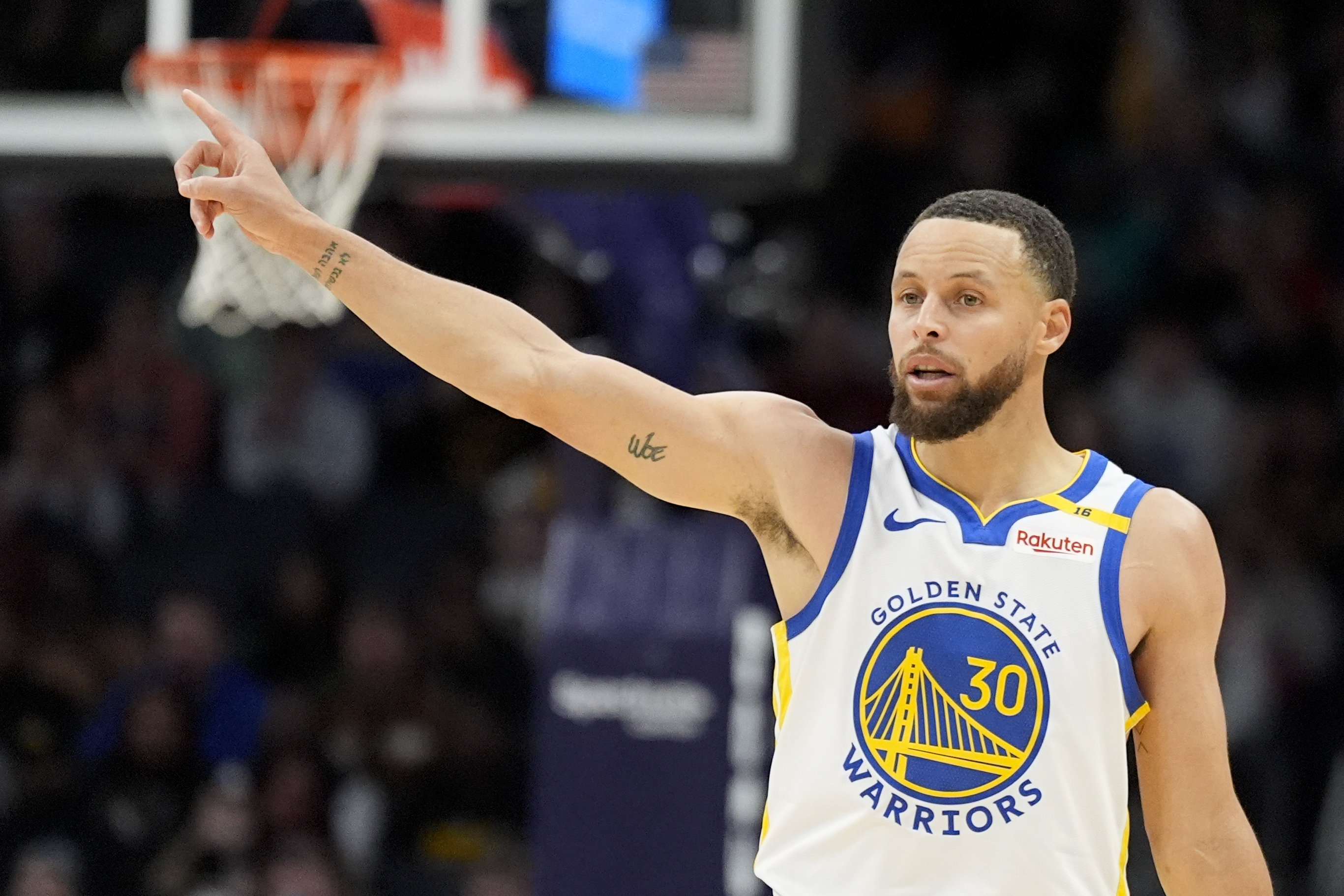 Golden State Warriors guard Stephen Curry gestures during the first half of an NBA basketball game against the Charlotte Hornets on Monday, March 3, 2025, in Charlotte, N.C. 