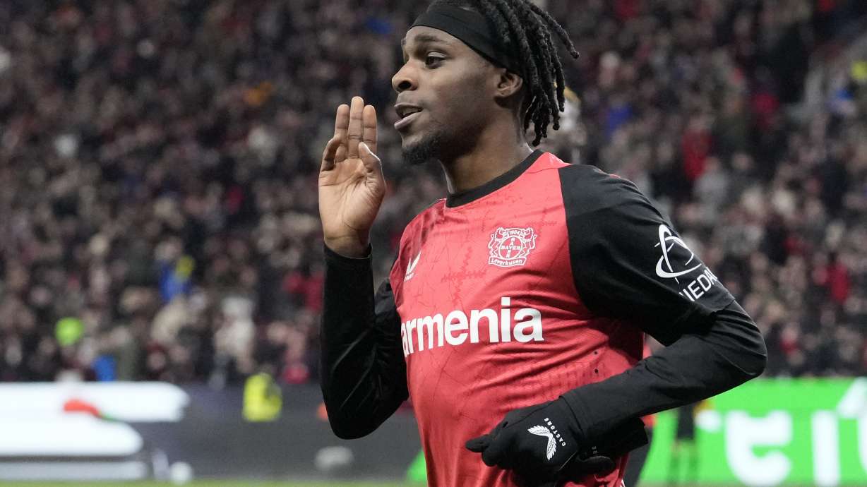 Leverkusen's Jeremie Frimpong celebrates after he scored his side's second goal during the German Bundesliga soccer match between Bayer Leverkusen and TSG Hoffenheim at the BayArena in Leverkusen, Germany, Sunday, Feb. 2, 2025.
