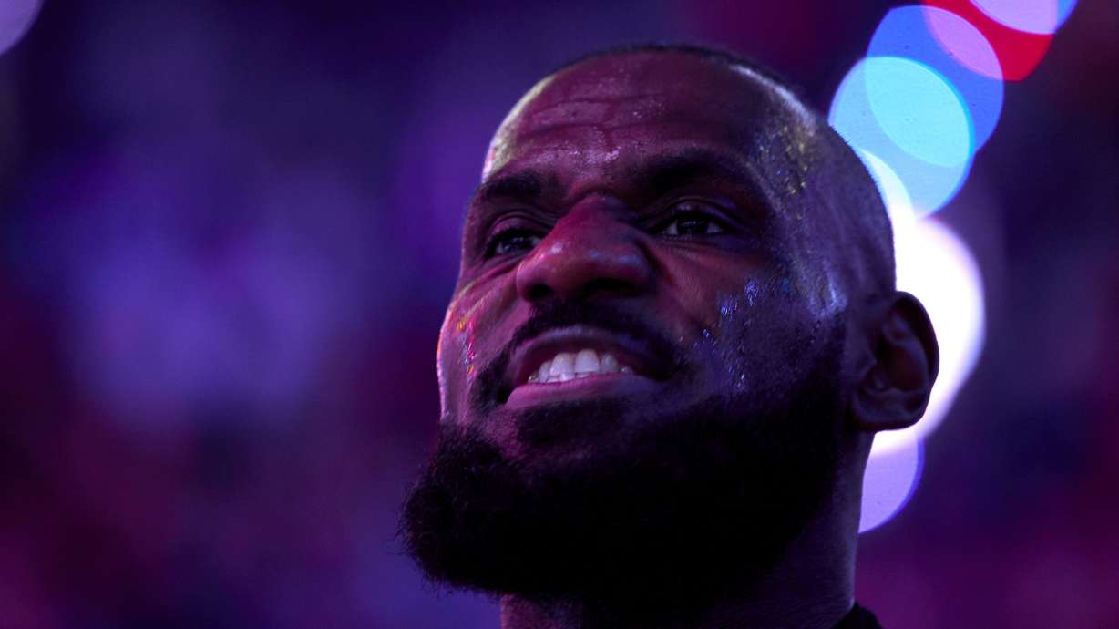 Los Angeles Lakers forward LeBron James grimaces during the national anthem before an NBA basketball game against the Portland Trail Blazers in Portland, Ore., Thursday, Feb. 20, 2025.