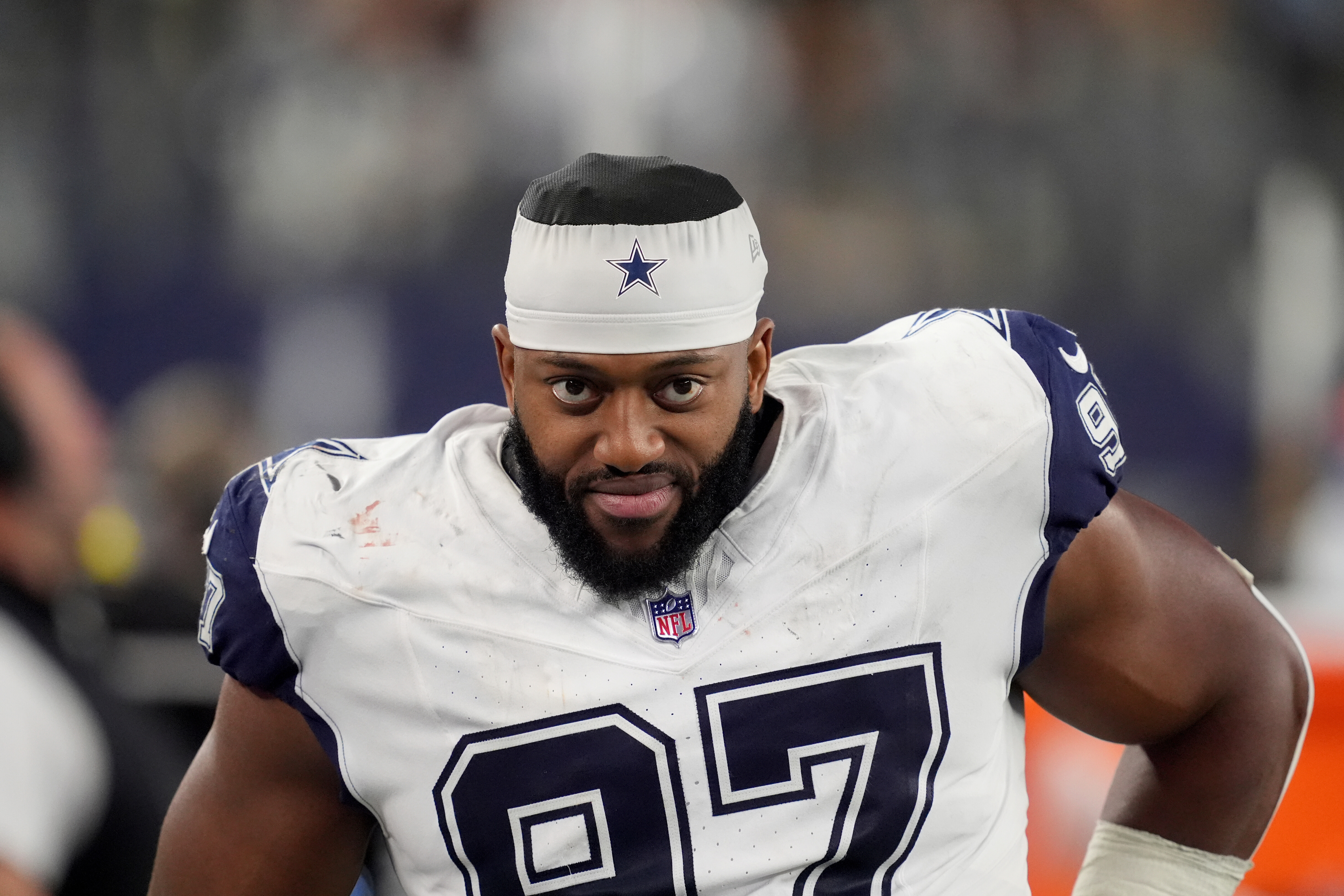 Dallas Cowboys defensive tackle Osa Odighizuwa walks along the sideline during an NFL football game against the Cincinnati Bengals in Arlington, Texas, Monday, Dec. 9, 2024. 
