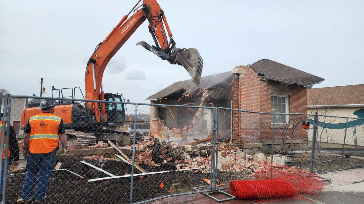 A former tithing office is being demolished to make way for the Fine Arts Center's outdoor amphitheater.