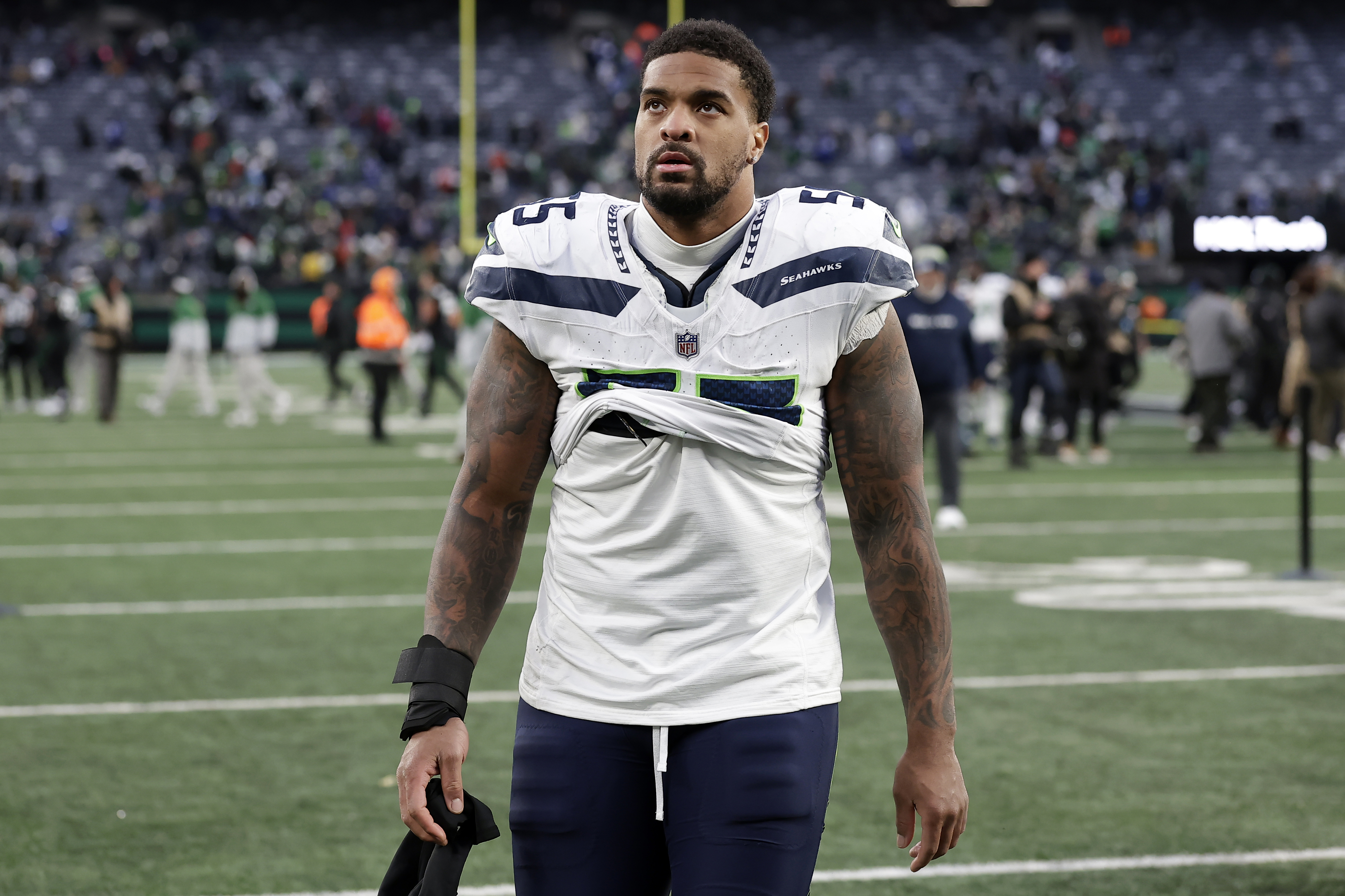 FILE - Seattle Seahawks defensive end Dre'Mont Jones (55) walks off the field after an NFL football game against the New York Jets Sunday, Dec. 1, 2024, in East Rutherford, N.J. 