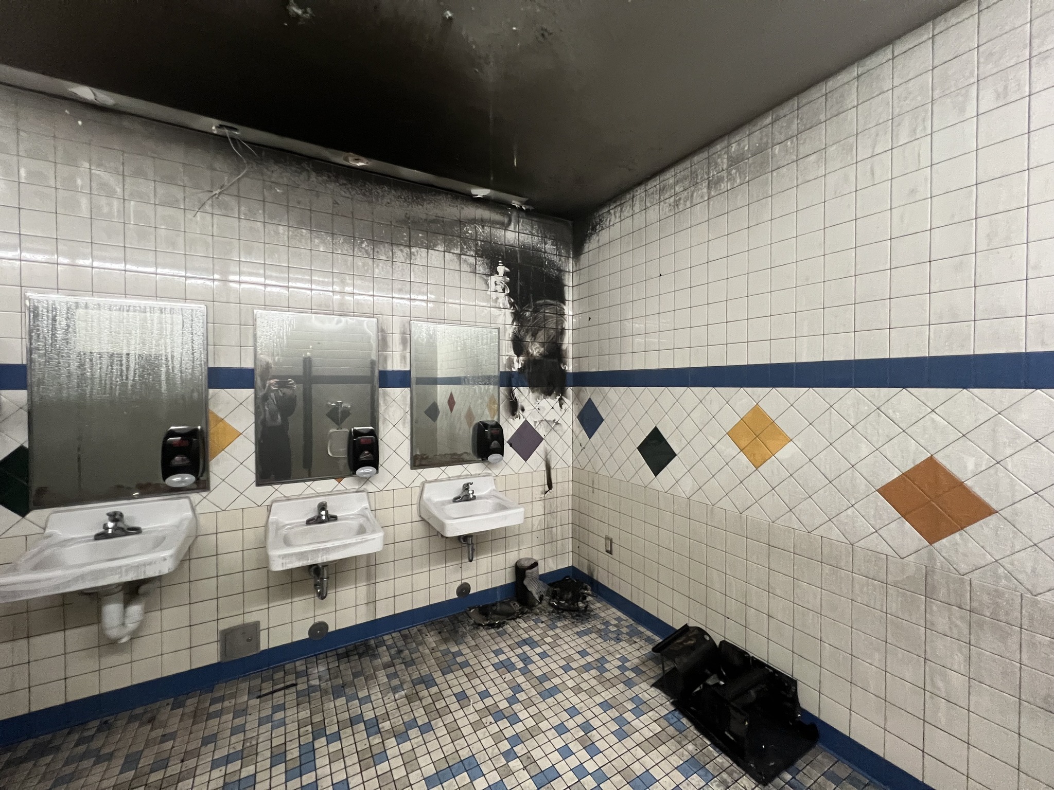 West Haven Elementary School was evacuated Tuesday after school officials say a student set a paper towel dispenser on fire in a bathroom, triggering the fire suppression system.