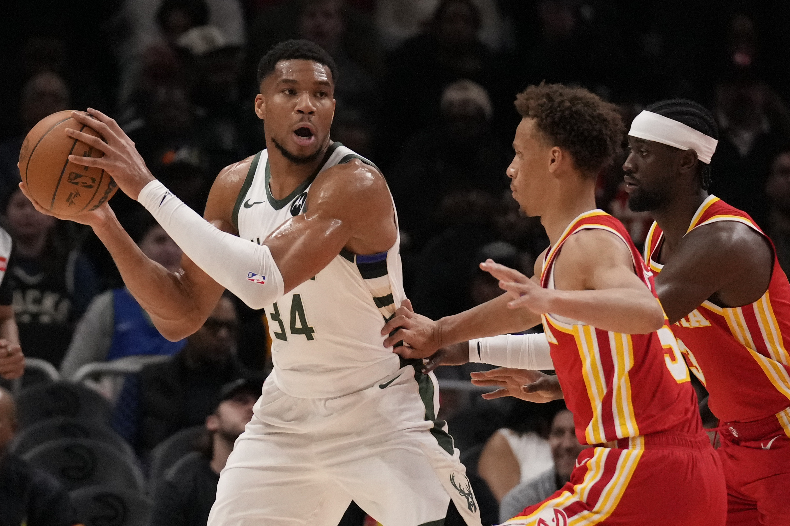 Milwaukee Bucks forward Giannis Antetokounmpo (34) looks to pass in the first half of an NBA basketball game against the Atlanta Hawks, Tuesday, March 4, 2025, in Atlanta. 