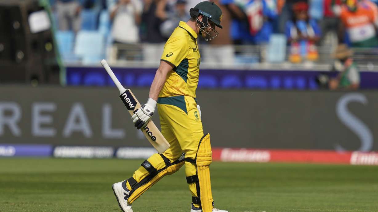 Australia's captain Steve Smith walks off the field after losing his wicket during the ICC Champions Trophy semifinal cricket match between India and Australia at Dubai International Cricket Stadium in Dubai, United Arab Emirates, Tuesday, March 4, 2025.