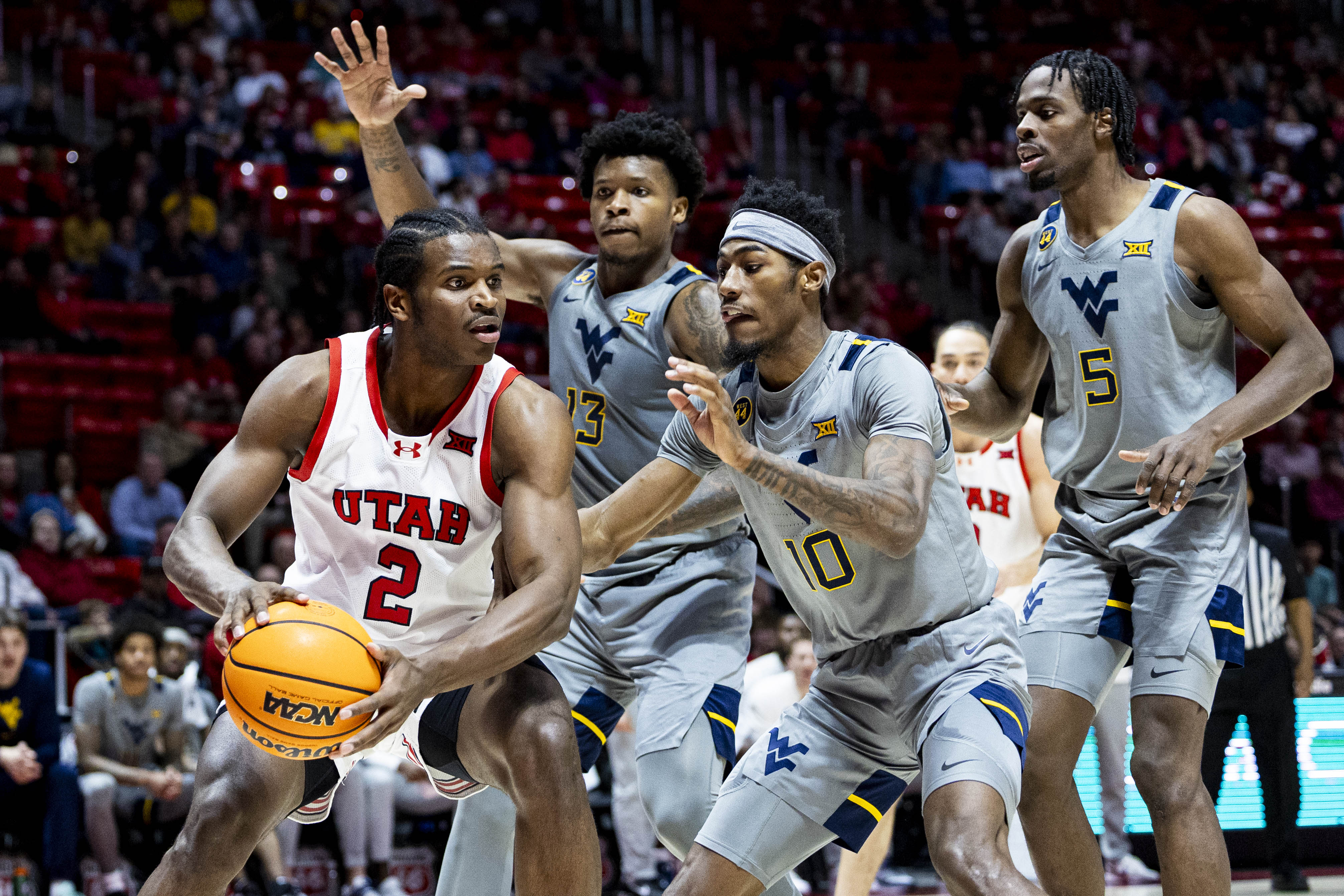 Runnin' Utes give up lead, fall to West Virginia 71-69 on senior night