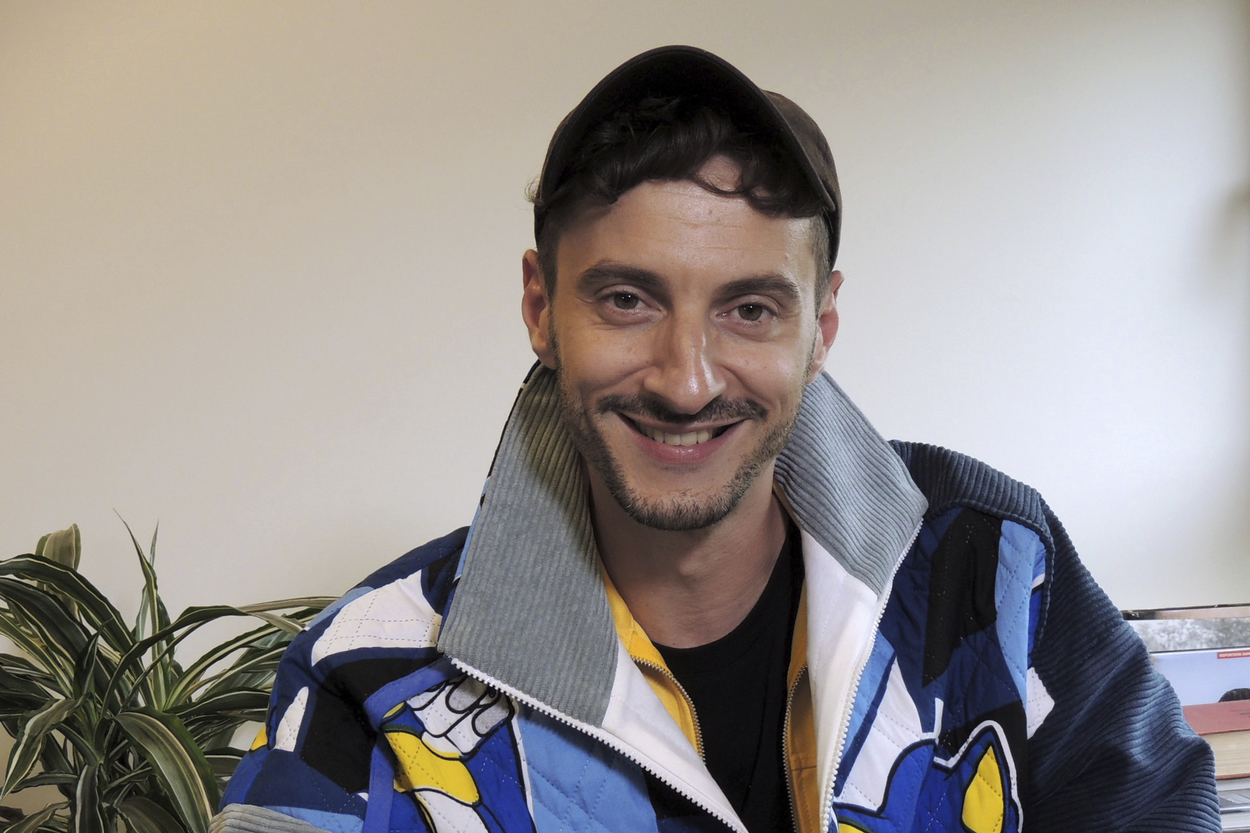 FILE - Artistic director Thomas Jolly, poses during an interview with the Associated Press, Thursday, Sept. 5, 2024, in Paris, France. 
