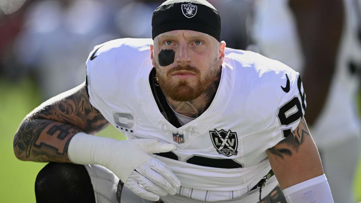 FILE - Las Vegas Raiders defensive end Maxx Crosby (98) warms up before an NFL football game against the Tampa Bay Buccaneers, Sunday, Dec. 8, 2024, in Tampa, Fla.