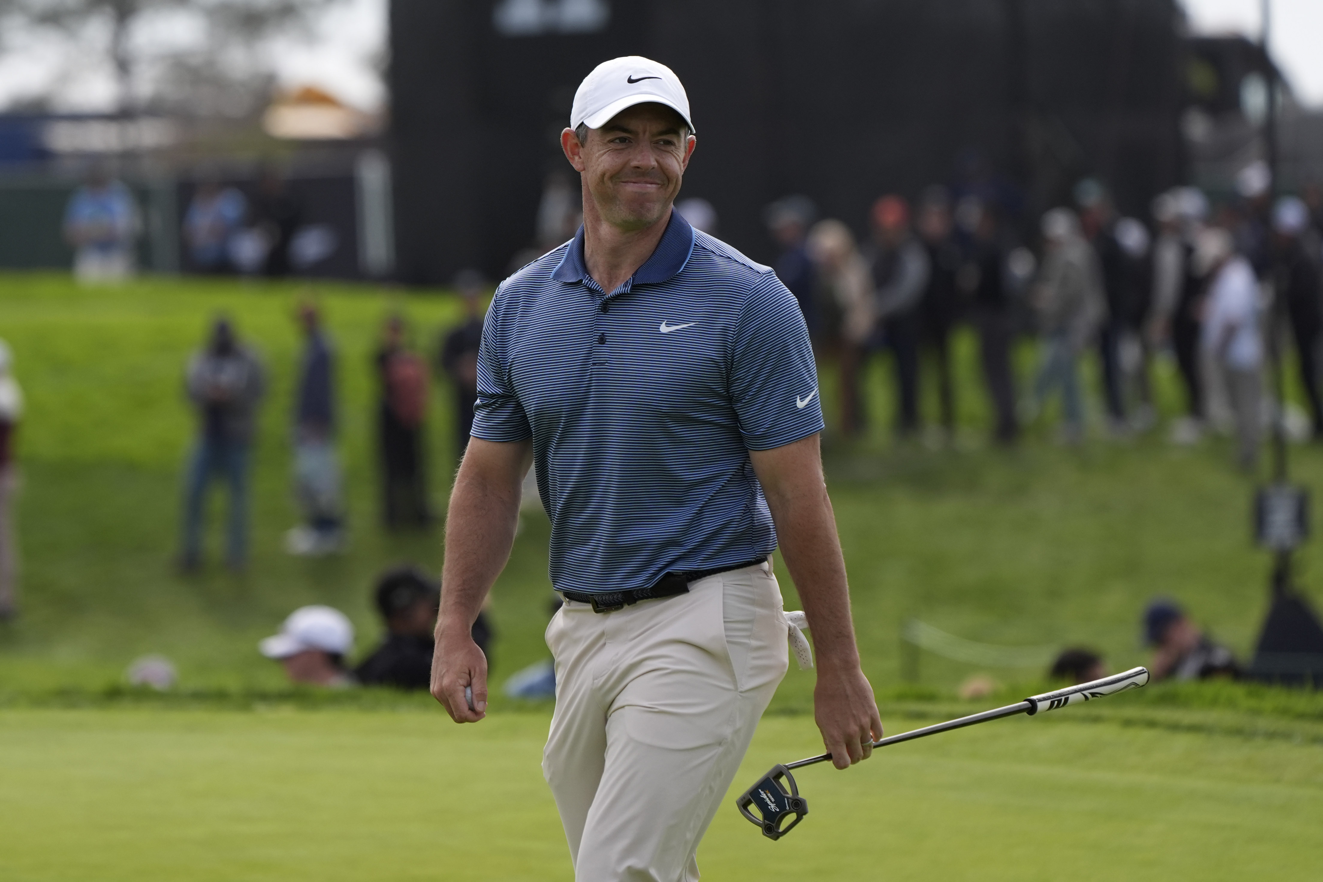 Rory McIlroy, of Northern Ireland, reacts after making a birdie on the 13th hole of the South Course at Torrey Pines during the final round of the Genesis Invitational golf tournament Sunday, Feb. 16, 2025, in San Diego.