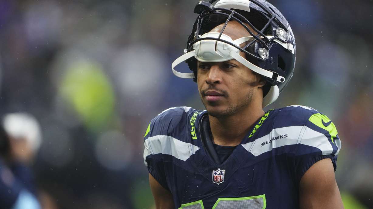 FILE - Seattle Seahawks wide receiver Tyler Lockett walks off the field during halftime against the Minnesota Vikings during an NFL football game Sunday, Dec. 22, 2024, in Seattle.