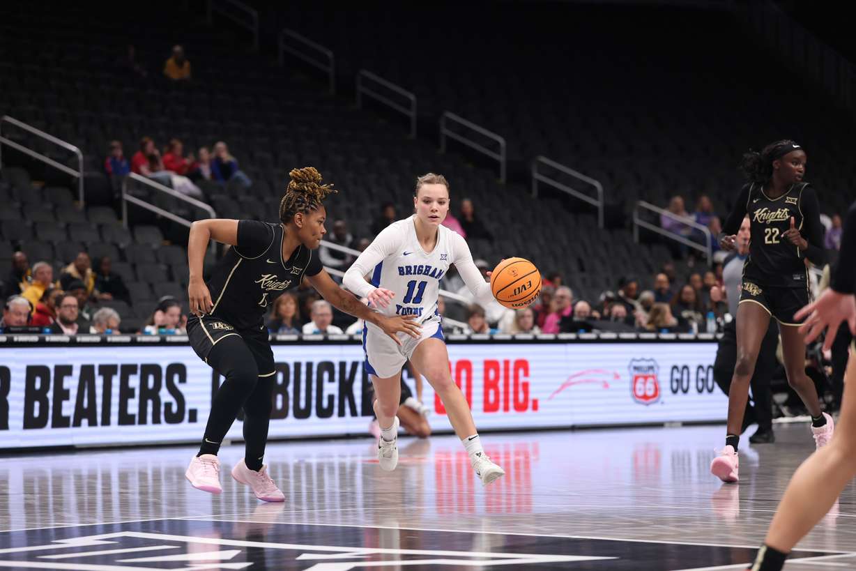 BYU's Delaney Gibb dribbles during a Big 12 women's basketball tournament game against UCF, Wednesday, March 5, 2025 in Kansas City, Mo.