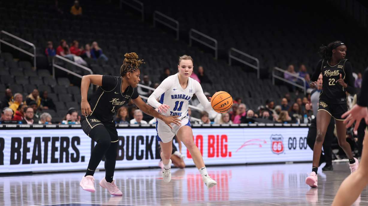 BYU's Delaney Gibb dribbles during a Big 12 women's basketball tournament game against UCF, Wednesday, March 5, 2025 in Kansas City, Mo.