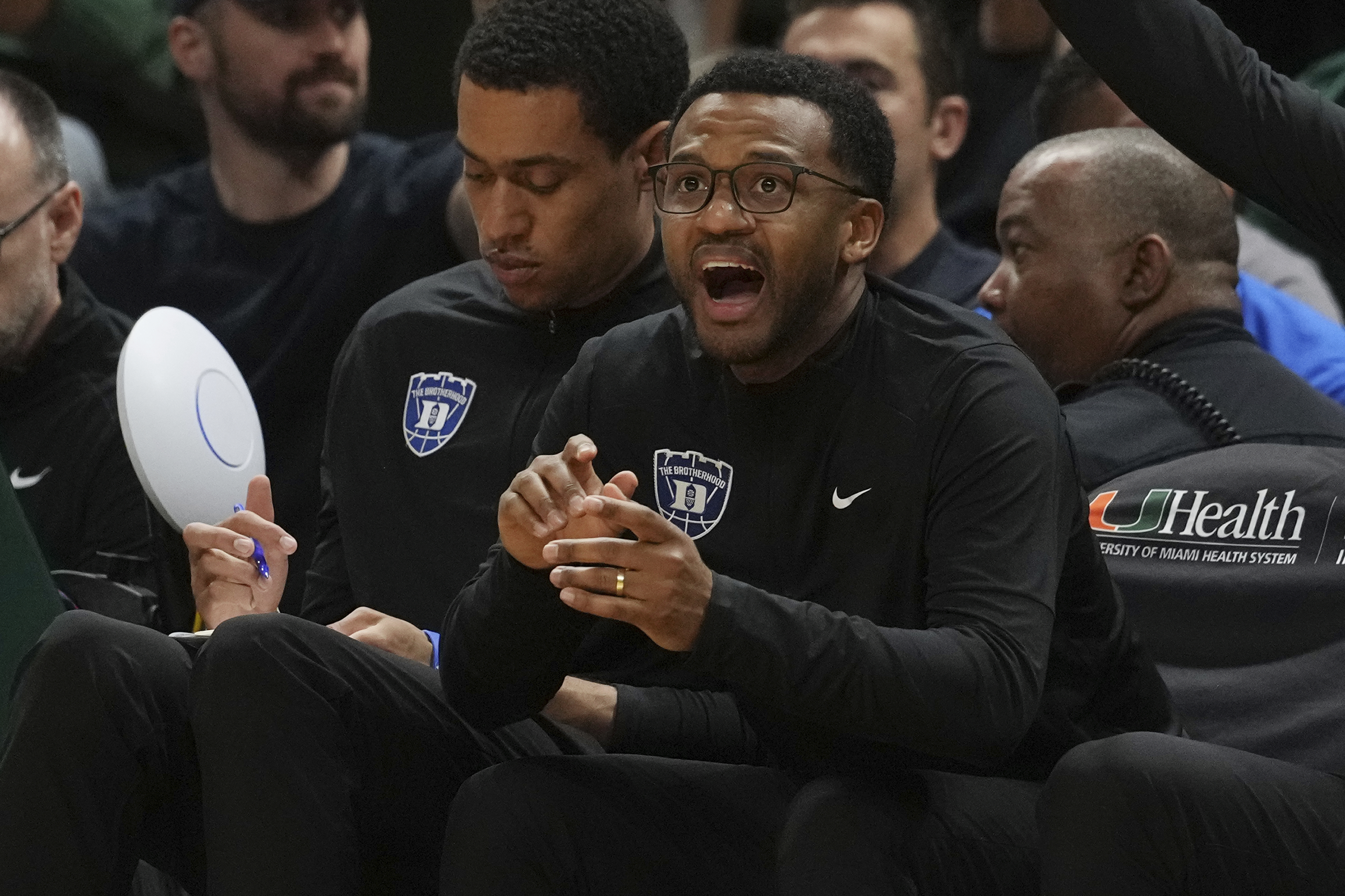 Duke associate coach Jai Lucas gestures during the second half of an NCAA college basketball game against Miami , Tuesday, Feb. 25, 2025, in Coral Gables, Fla. 