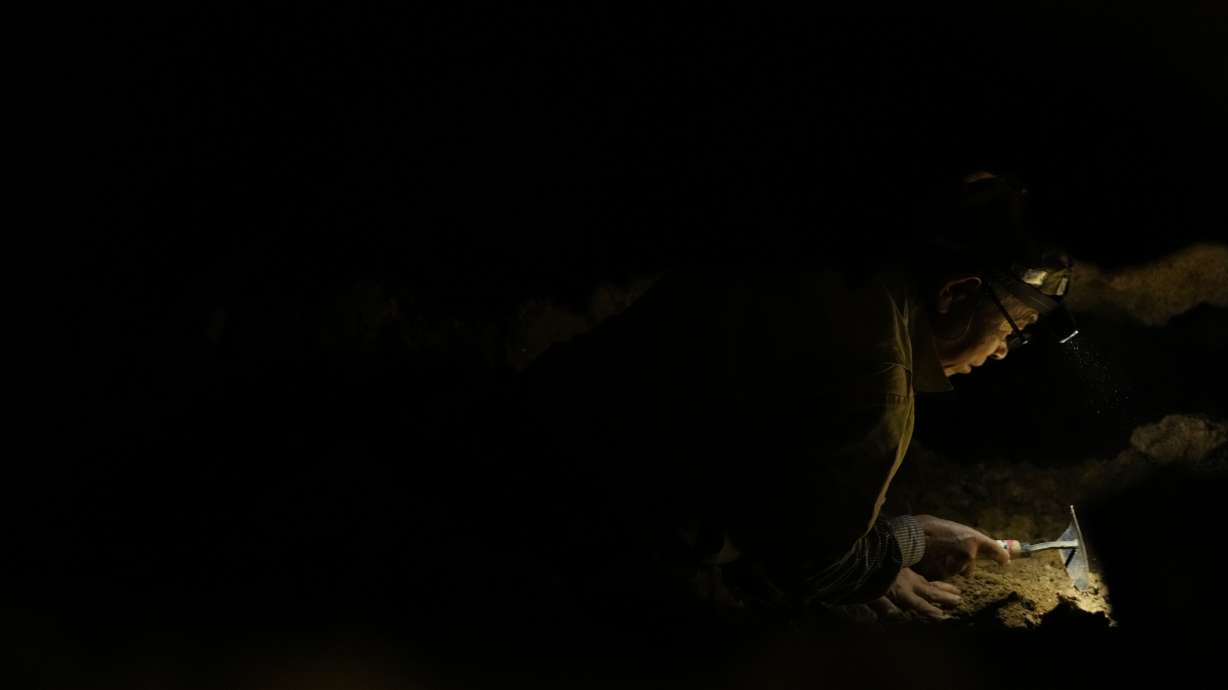 Takamatsu Gushiken searches for the remains of those who died during the Battle of Okinawa toward the end of the World War II in 1945, in Itoman, on the main island of the Okinawa archipelago, southern Japan, Feb. 15.