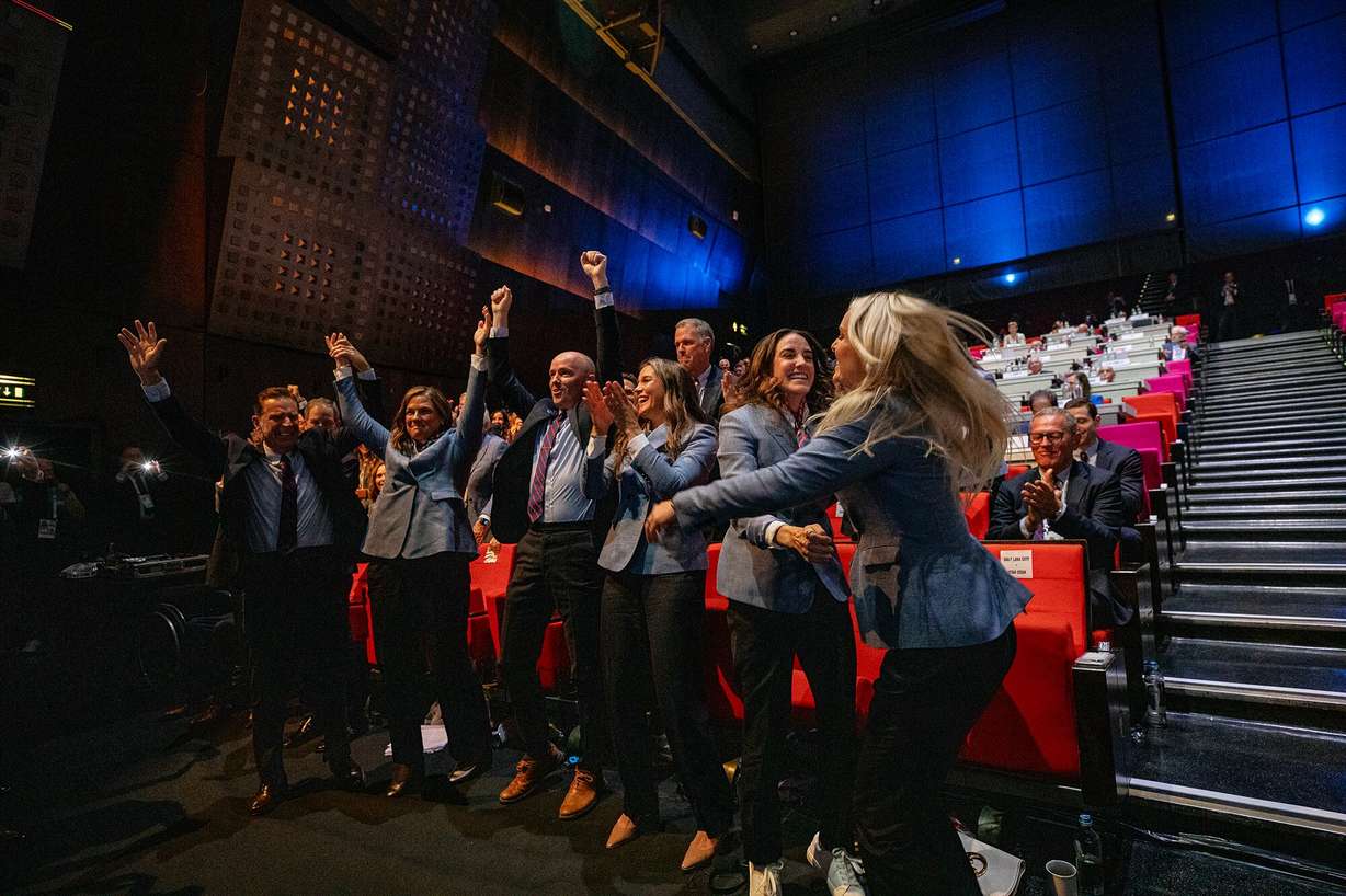 The Utah delegation celebrates after Salt Lake City was named Olympics host again as the IOC formally awarded the 2034 Winter Games to the United States bid, July 24, 2024, in Paris, France.