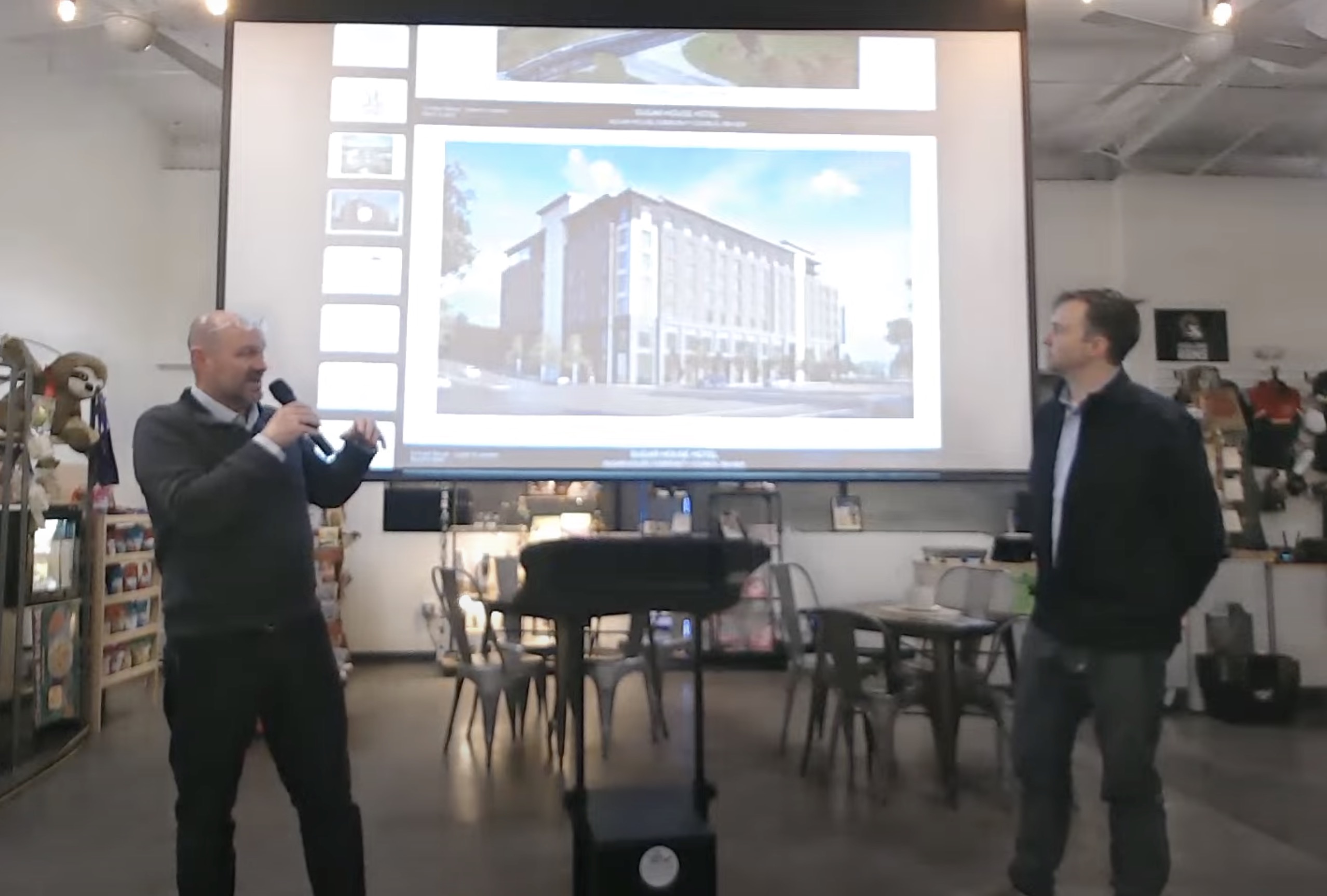 Jackson Ferguson, principal architect for FFKR, left, and John Potter, CEO of Magnus Hotel Management, right, share plans for a potential new hotel in Sugar House during a Sugar House Community Council, meeting Wednesday night.