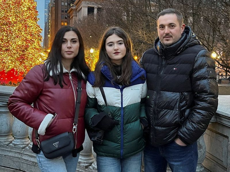 Liana Avetisian poses with her daughter Karine and her husband Serhii during a visit to Chicago, Ill., in Dec. 2023.