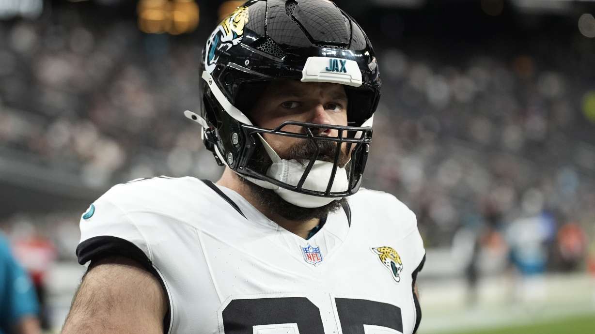 Jacksonville Jaguars center Mitch Morse (65) warms up before an NFL football game, Sunday, Dec. 22, 2024, in Las Vegas.