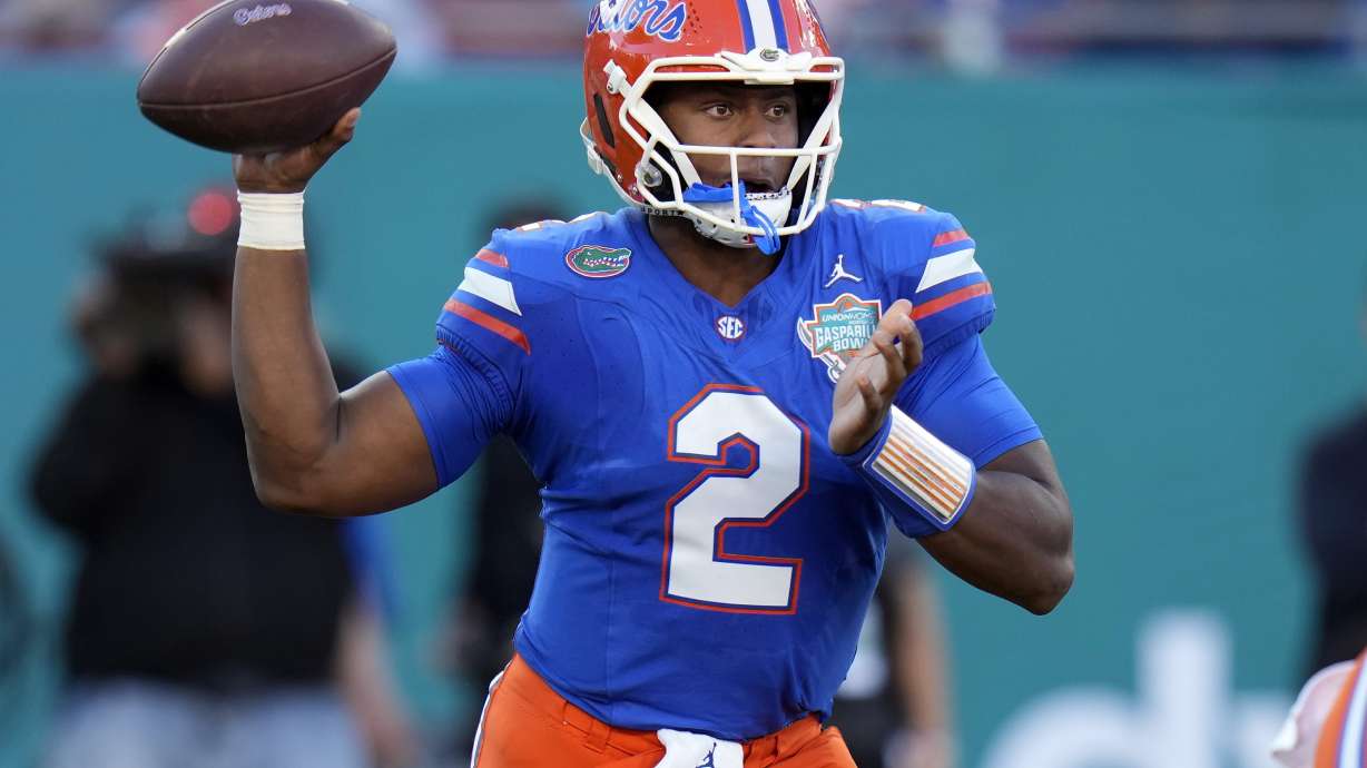 FILE - Florida quarterback DJ Lagway (2) throws a pass against Tulane during the first half of the Gasparilla Bowl NCAA college football game, Dec. 20, 2024, in Tampa, Fla.