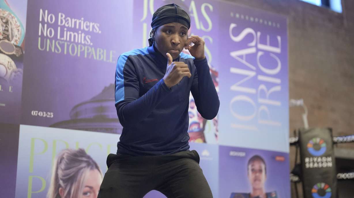 Olympic refugee boxer Cindy Ngamba attends boxing media workout in London, Tuesday, March 4, 2025. Cindy Ngamba makes her pro boxing debut Friday in London. Ngamba is the Cameroonian who made history at the Paris Olympics when she became the first athlete competing as a refugee to earn a medal.