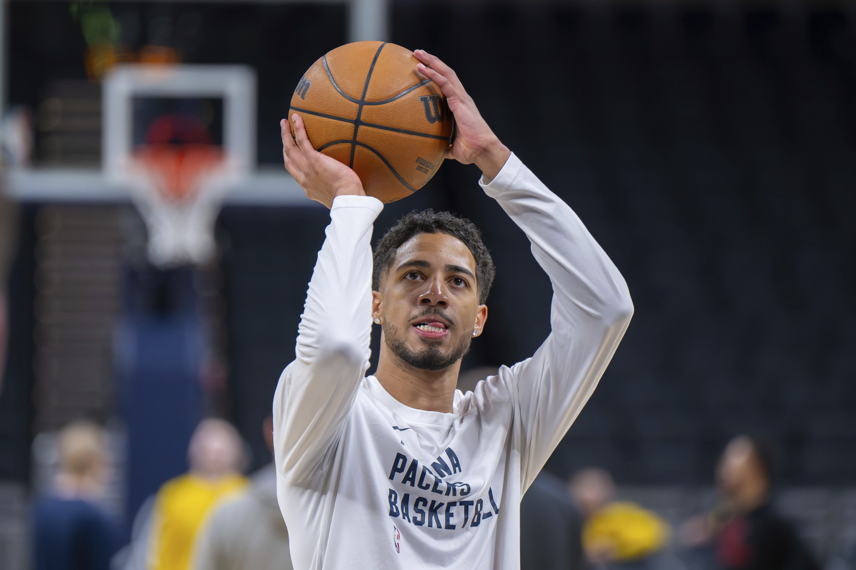 Indiana Pacers guard Tyrese Haliburton warms up on the court before an NBA basketball game against the Chicago Bulls in Indianapolis, Sunday, March 2, 2025.