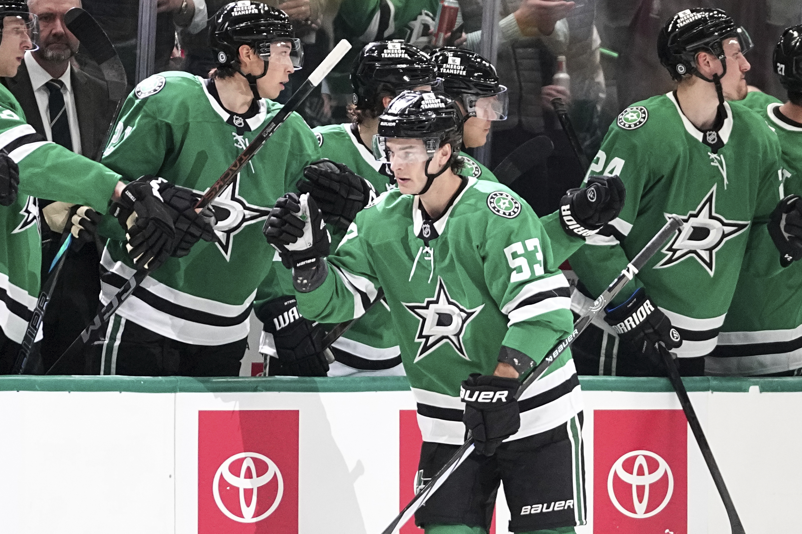 Dallas Stars center Wyatt Johnston (53) celebrates with the bench after scoring against the Calgary Flames in the second period of an NHL hockey game in Dallas, Thursday, March 6, 2025. 